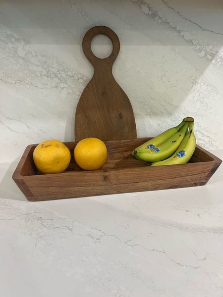 Love my new wooden bowl from WALMART! It’s under $20 and such a pretty stain color! I have 2 huge grapefruit and a bunch of bananas, plenty of room to add more! Could also be used as a decor bowl on a shelf or filled with anything else! Even a “catch all bowl” at your entryway! 

#LTKHome #LTKFindsUnder50 #LTKStyleTip