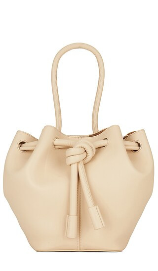 Small Elongated Bucket Bag in Ivory | Revolve Clothing (Global)