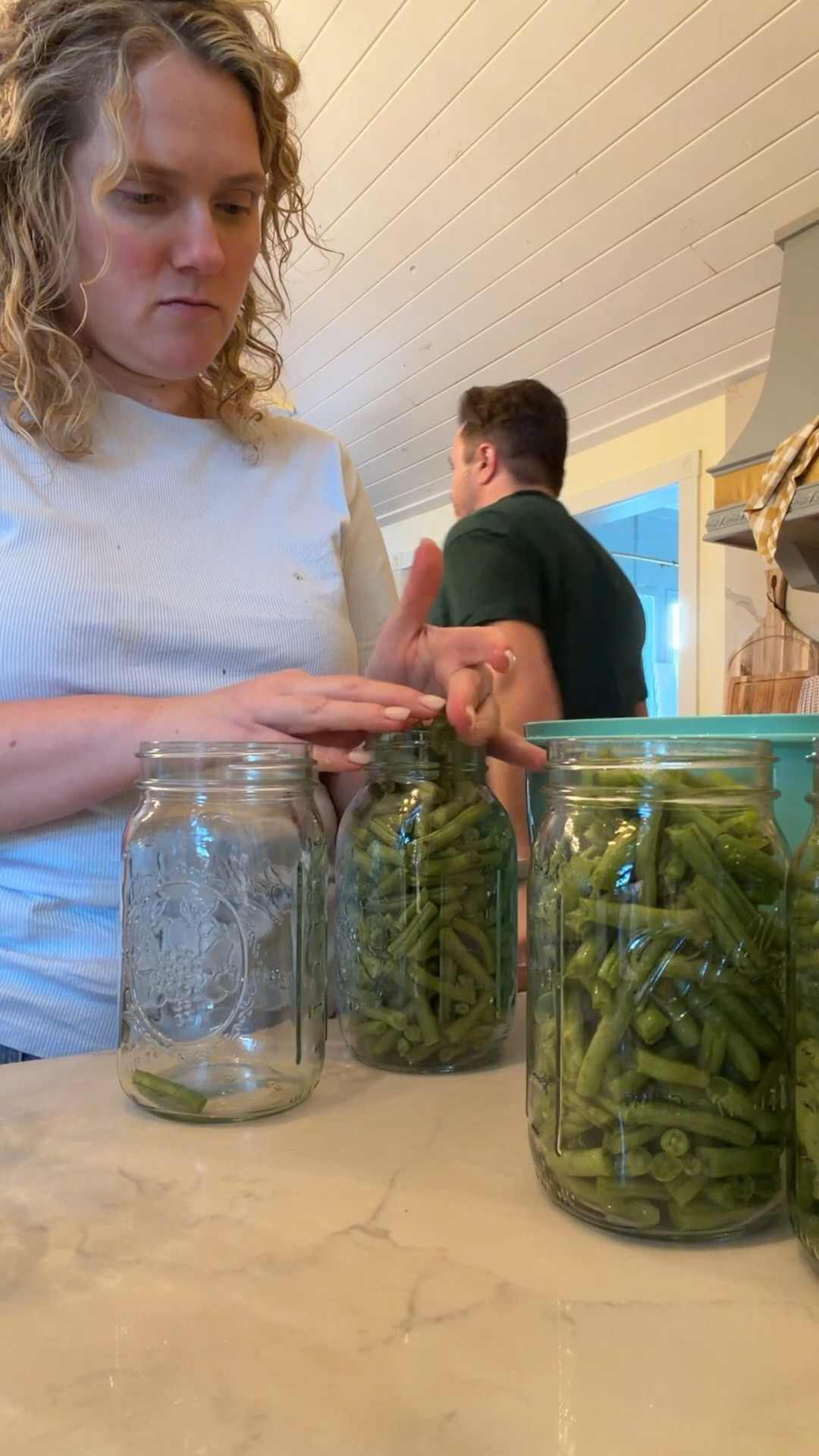 Water bath canning uses boiling water for high-acid foods like jams and pickles, while pressure canning uses high heat under pressure to safely preserve low-acid foods like vegetables, meat, and soups.

#LTKmomlife