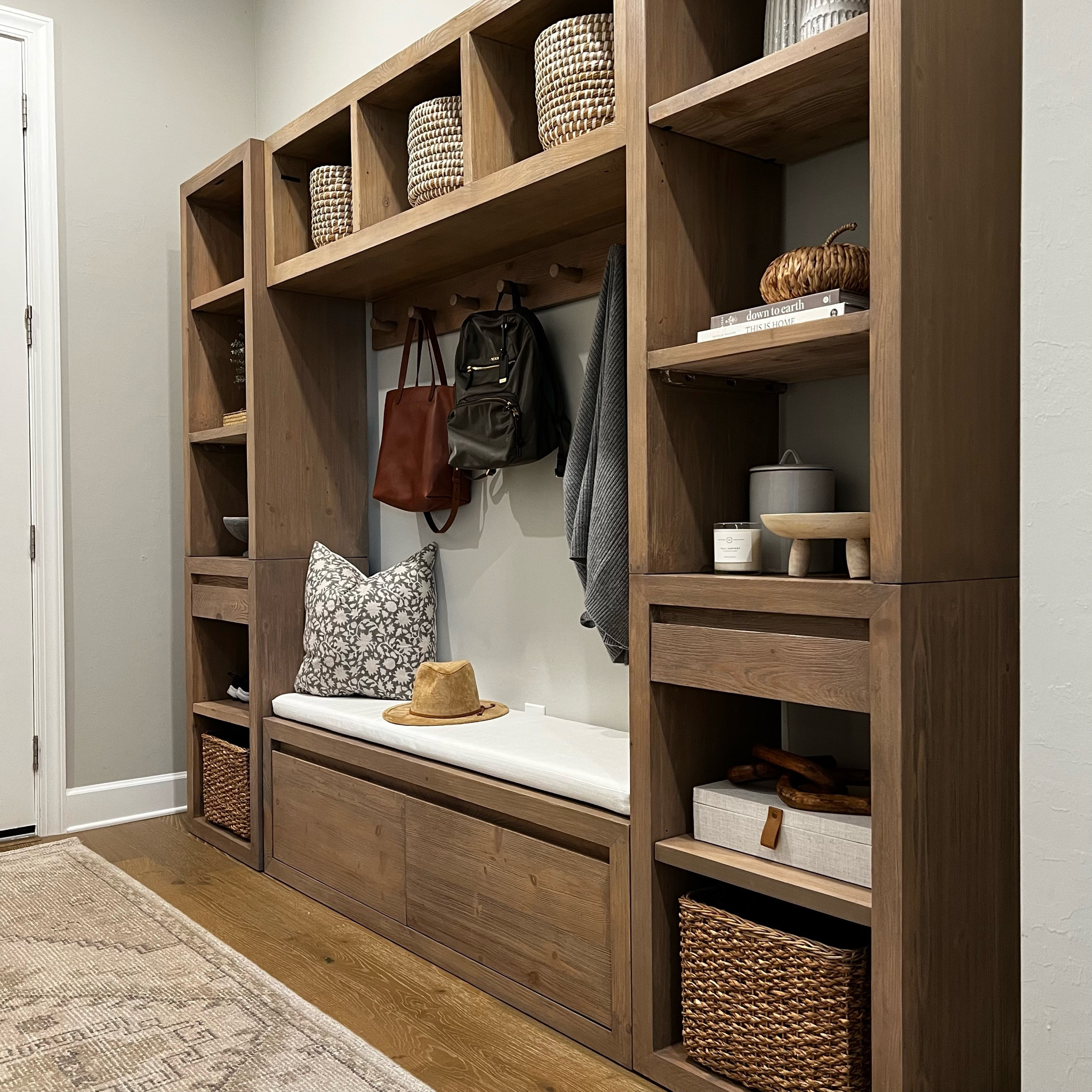 Loving this piece in our mudroom! 
I got the natural color and stained it (Flagstone is the color)