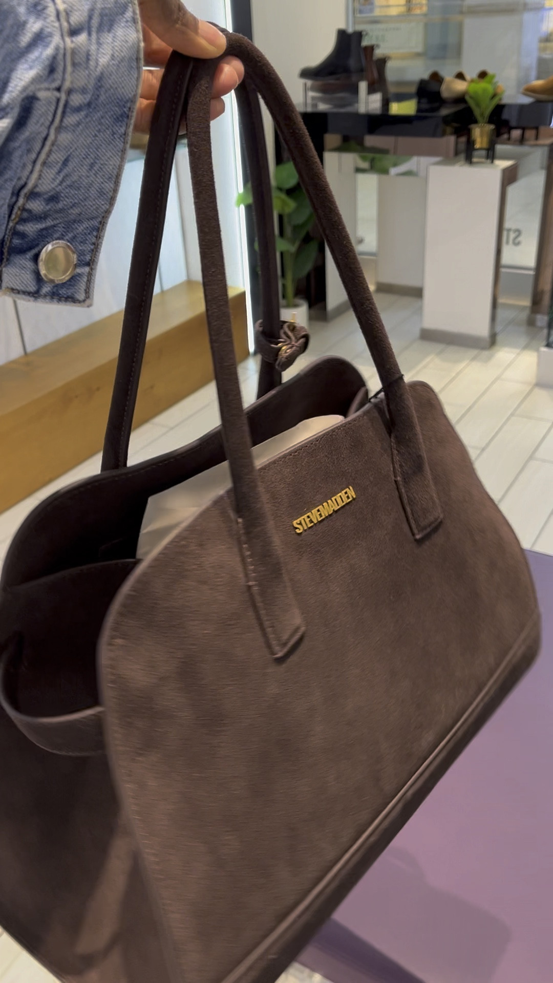 If you’re not into paying $5,600 for the Soft Margaux bag from The Row, Steve Madden has a bag that looks VV similar for $199 and it’s suede. 