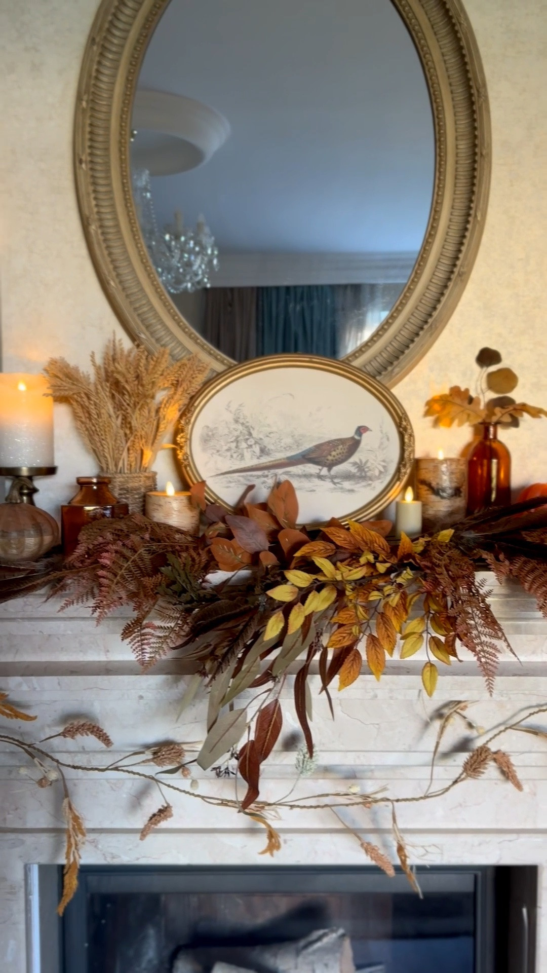 Fall living room mantel decor, pheasant print, @Michaels fall leaf stems, pumpkin candle

#LTKHome #LTKSeasonal #LTKSaleAlert