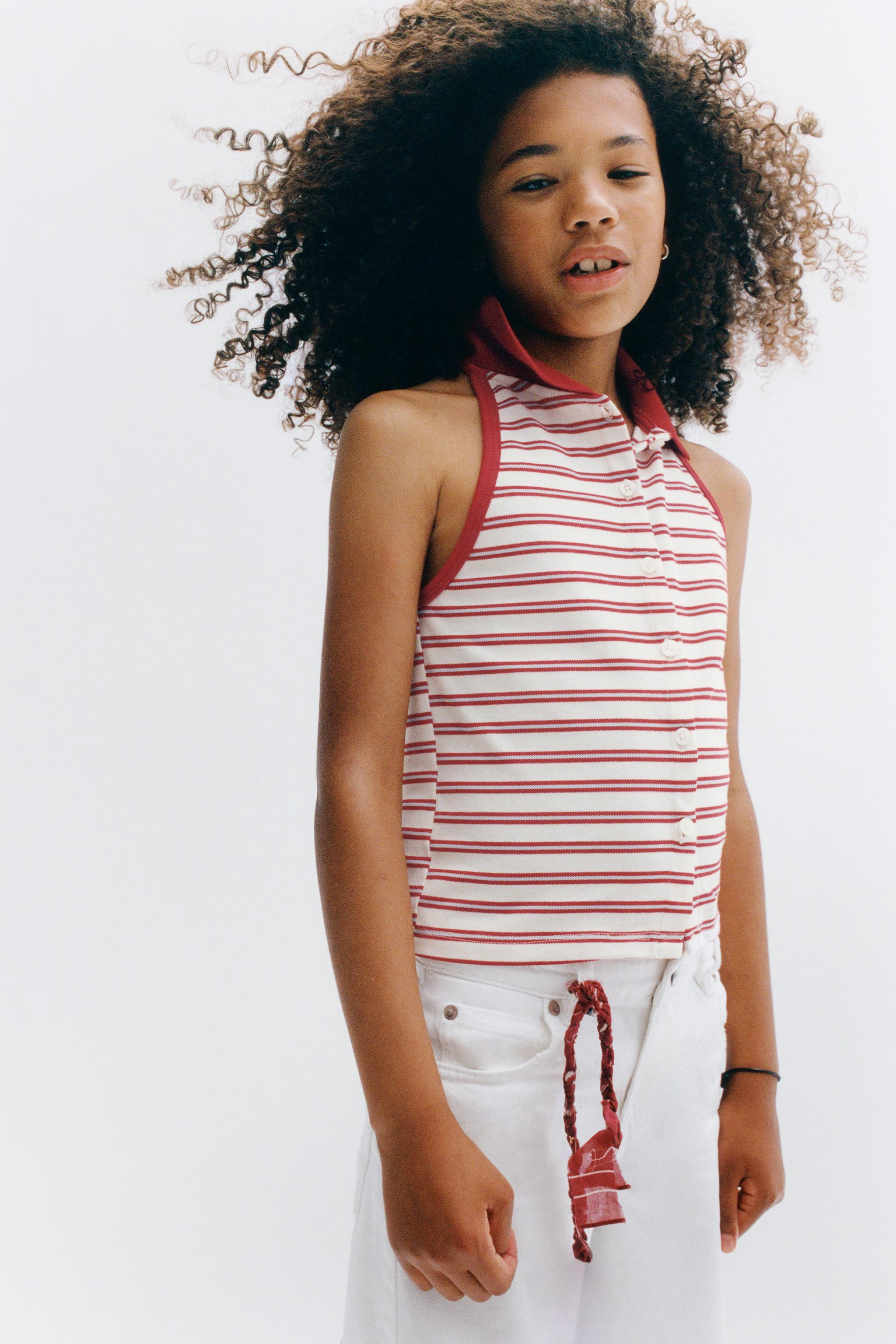 Halter neck polo shirt with sleeveless design. Front button closure. Striped print. | Zara US