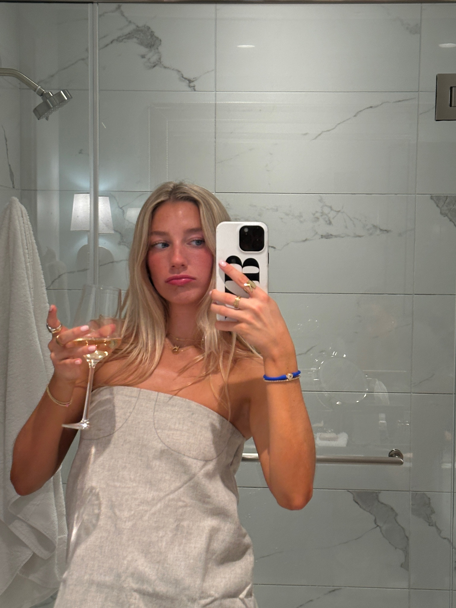 Strapless cream wool tube top styled with gold jewelry and initial phone case 

#LTKfindsunder50 #LTKsalealert #LTKGiftGuide