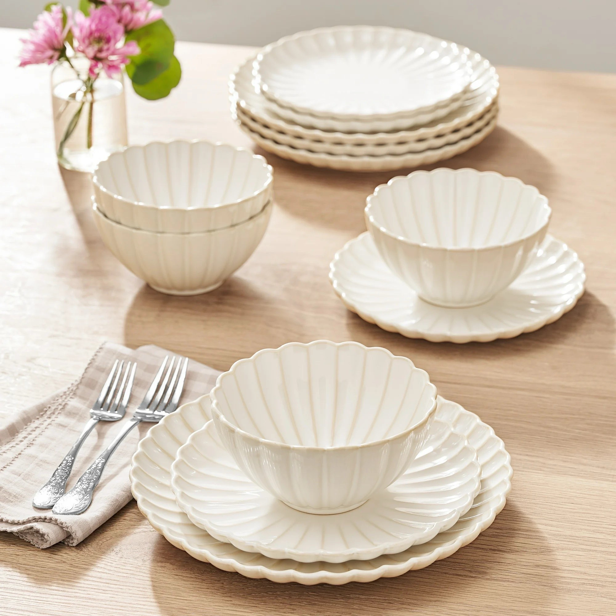 This scalloped dinnerware collection from Walmart is absolutely beautiful and so affordable! I'm loving the trio of scalloped plates and bowls. Comes in a set of 4 place settings in cream, blue, green, and lavender. The Pioneer Woman knocked it out of the park with this scalloped tablescape look! Perfect Mother's Day gift or gift for moms! 

#LTKHome #LTKGiftGuide #LTKSeasonal
