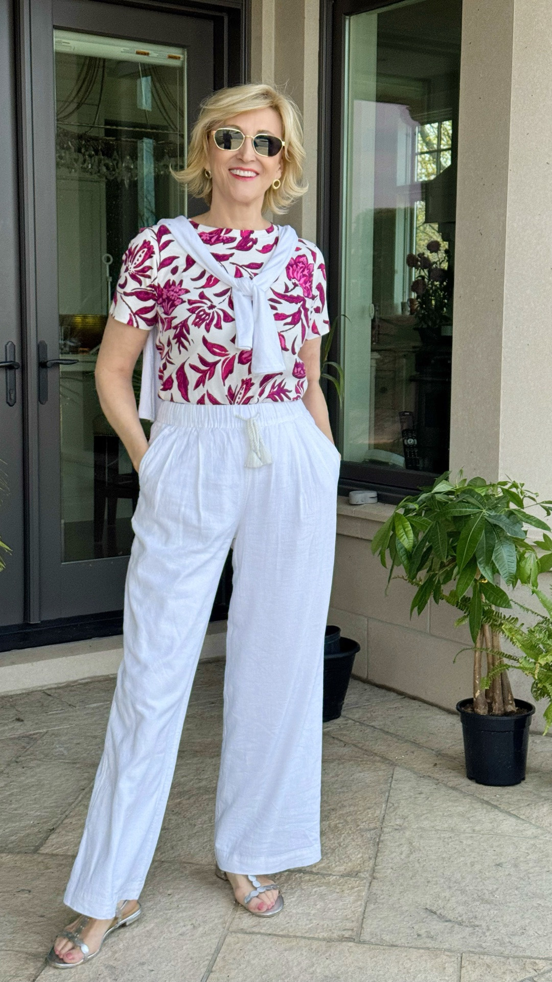 I’m loving how fresh and easy this outfit feels! 🌸 A pretty floral tee paired with crisp white linen pants is such a simple combination, and the silver sandals add just the right little touch of sparkle.

It’s comfortable, feminine and effortlessly put together — exactly what I want on a warm day when I still want to feel polished. ✨

#LTKOver40 #LTKSeasonal #LTKootd