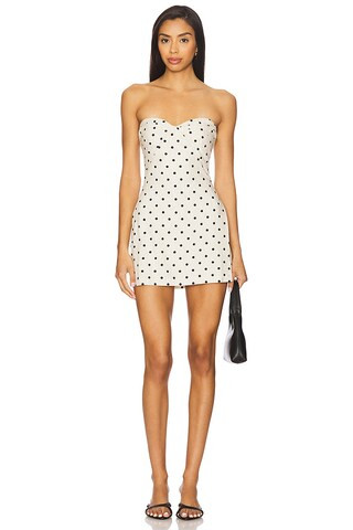 Amanda Uprichard Soho Skort Romper in Beige & Black from Revolve.com | Revolve Clothing (Global)