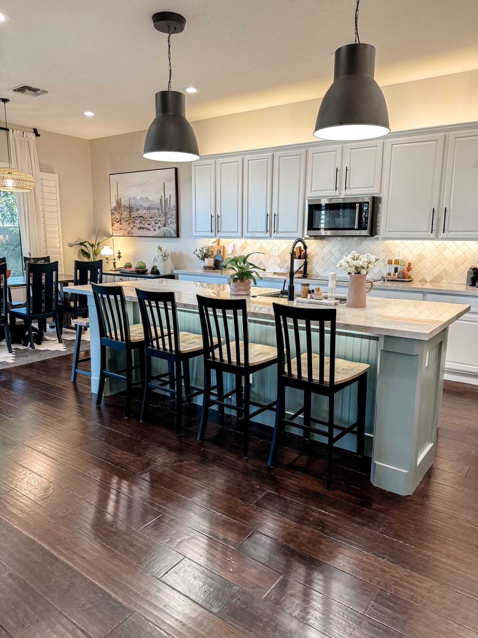 #ad Can you believe this layered lighting was added in minutes?! We used @PhilipsHue lighting from @Target to our kitchen island and it's completely elevated the feel and mood of the space! My goal for the kitchen lighting is to be able to change between warm & cool lighting throughout the day... so sometimes we will use the preset "scenes" to give off different moods, but for our daily default, we opt for the "natural light" setting. That starts off with a cool light in the morning to wake you up, and as the day goes on, it slowly adjusts to more of a warm light, to let you unwind as it gets later in the evening. It's perfect!! Linking everything below for everything we used to upgrade our kitchen! #philipshue #smartlighting #homeinspo #TargetPartner #Target

#LTKFindsUnder100 #LTKHome #LTKSeasonal