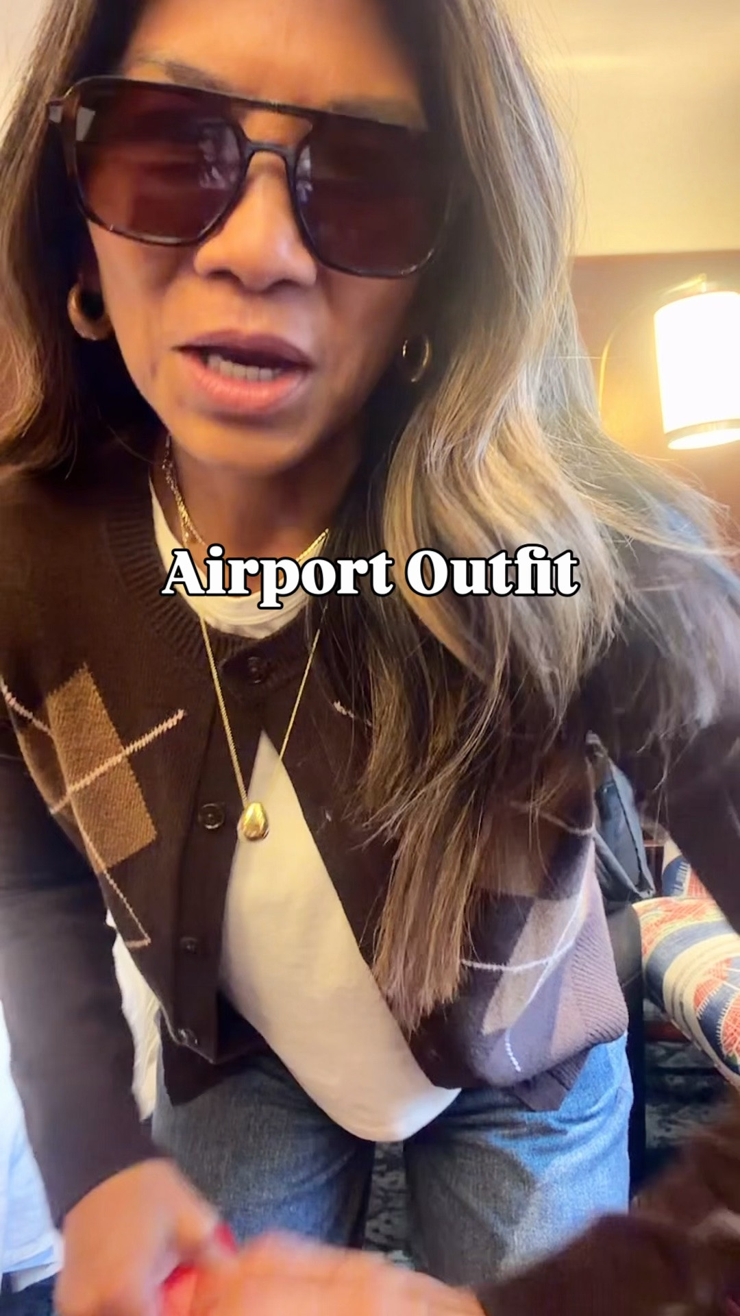 I’m 5’2” 118#ish for reference 
Airport Outfit!

Red sweater in small tts.
Argyle cardigan in small tts.
Sweatpant jeans I sized down to 25. Wash is Venice- still a favorite! There’s nothing like it! 
White tee in small tts. 
Sneakers fit tts-if you have wide feet reviews say to size up-I stayed with my true size. Very comfy! 

I love my new fall bag so much! I used it in NYC, airport outfit, and as a clutch for date night last night!  The outside is real suede, inside is real leather, it’s lightweight! I have the color Dark Chocolate. The other colors is called Warm Brown and it’s so pretty too. Also comes in leather. I linked in a few stores.
Carry-on luggage is the small size.
Personal bag(black) is linked-fits under most plane seats! 

airport outfit, travel outfit, fall outfit, fall bag, comfy sneakers, low profile sneakers, suede bag, Coach Chelsea 36, over 50 style, midlife fashion, petite fashion,midlife women, affordable fashion, fashion over40

#LTKNYFW #LTKPetite #LTKTravel