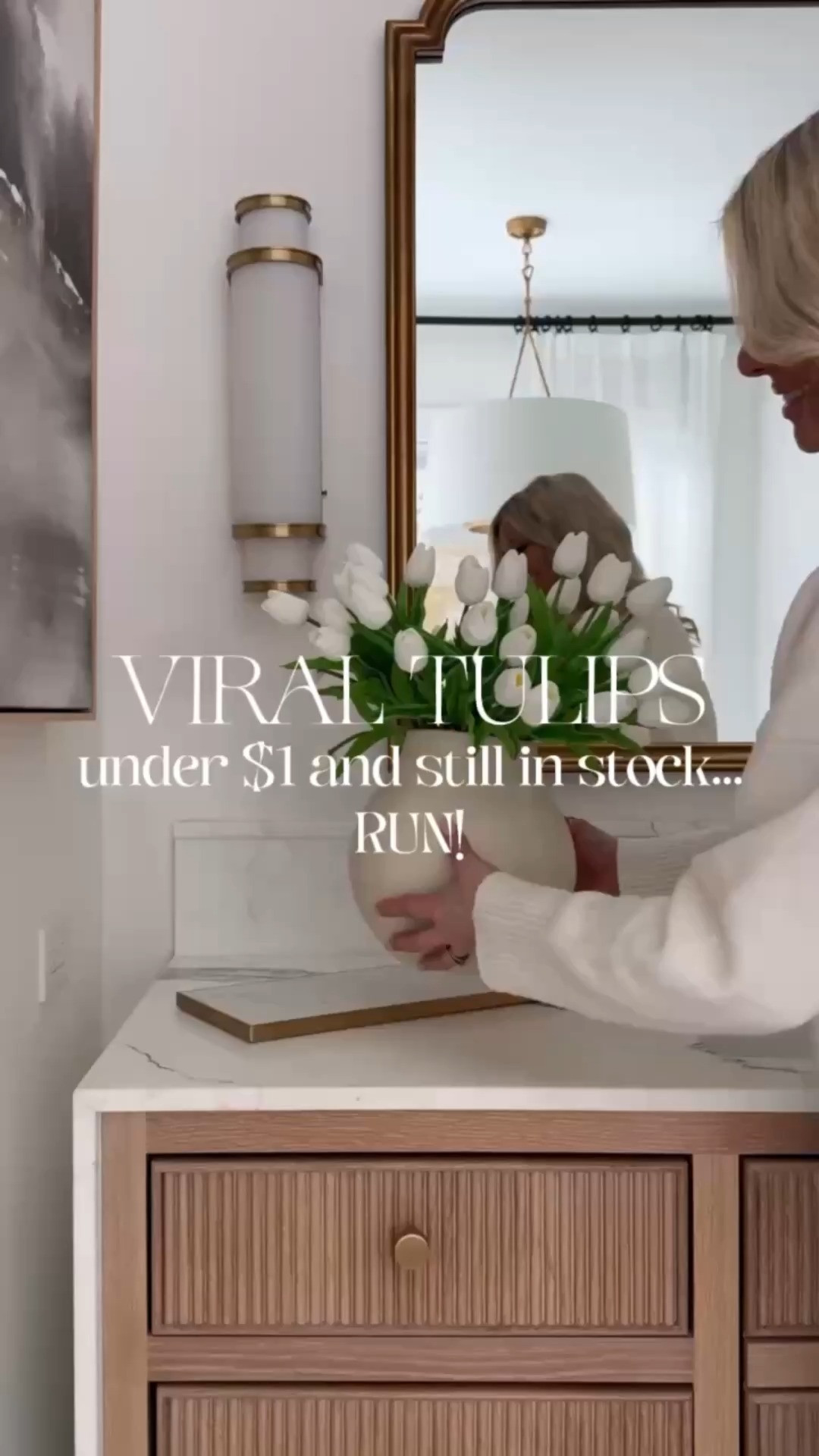 These FAUX WHITE TULIPS are under $1 per stem and look unbelievably realistic. The soft white petals and natural green stems give that HIGH-END FLORAL look without the constant replacing.

I style them in oversized CERAMIC VASES for a full, designer arrangement that instantly elevates an ENTRYWAY, NIGHTSTAND, or BATHROOM COUNTER. No watering. No wilting. Just effortless, year-round beauty.

If you love a CLEAN, NEUTRAL, LUXURY aesthetic… these are a must.

#Amazon #TheHillaryStyle #AmazonFinds #FauxFlowers #WhiteTulips #NeutralHome #LuxuryHomeDecor #DesignerStyle #HomeDecorFinds #ModernOrganic 

 #LTKSeasonal #LTKOver40 #LTKHome