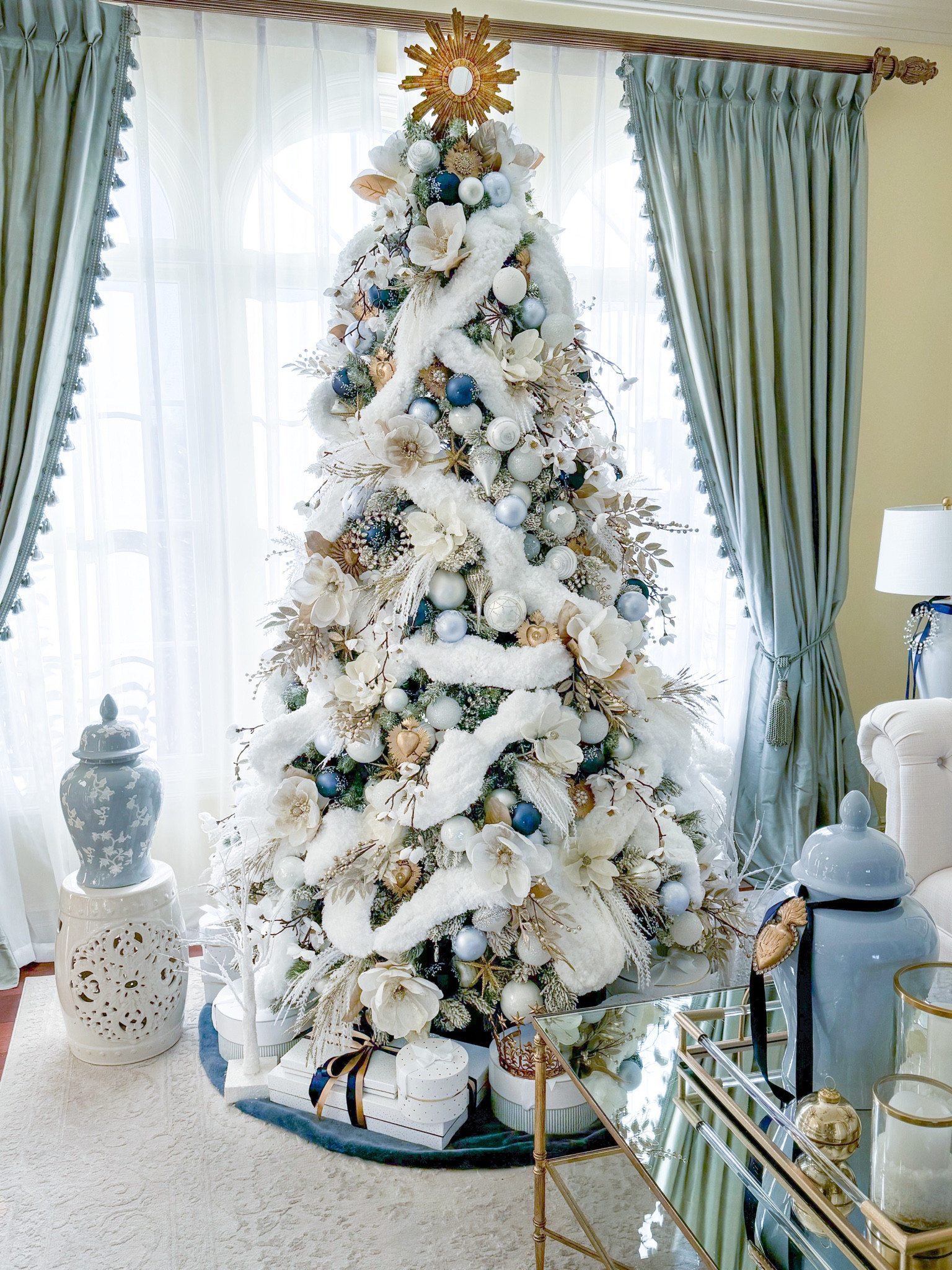 Shop my “Starry Sapphire Night” Christmas tree!

Blue and white Christmas tree, blue and white decor, blue Christmas, blue ornaments, navy ornaments, snowy Christmas tree, grand millennial, blue ginger jar, gift boxes, sacred hearts, magnolia picks, star ornaments, gold tree topper, Ballard designs, king of Christmas, garden stool, hurricane candleholders 

#LTKHoliday #LTKHome #LTKSeasonal