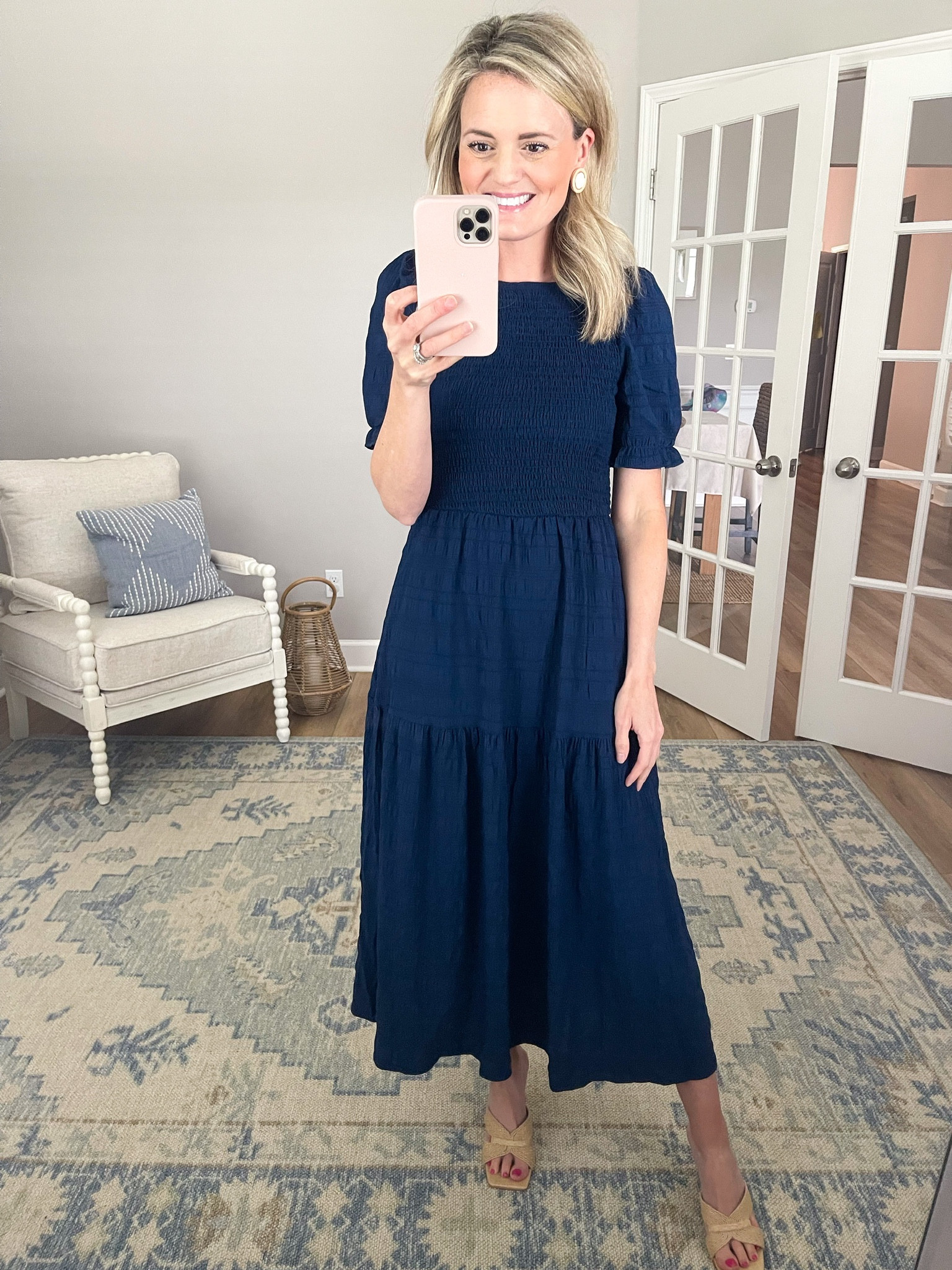 There are a ton of dresses out in this type of silhouette.  This maxi dress caught my eye with the textured fabric and high neck.  The puff sleeves are very flattering and I chose navy because it’s a classic.  Pair with a simple earring, clutch and you are ready for date night.  I am wearing the size small dress.

#LTKfamily #LTKSeasonal #LTKstyletip