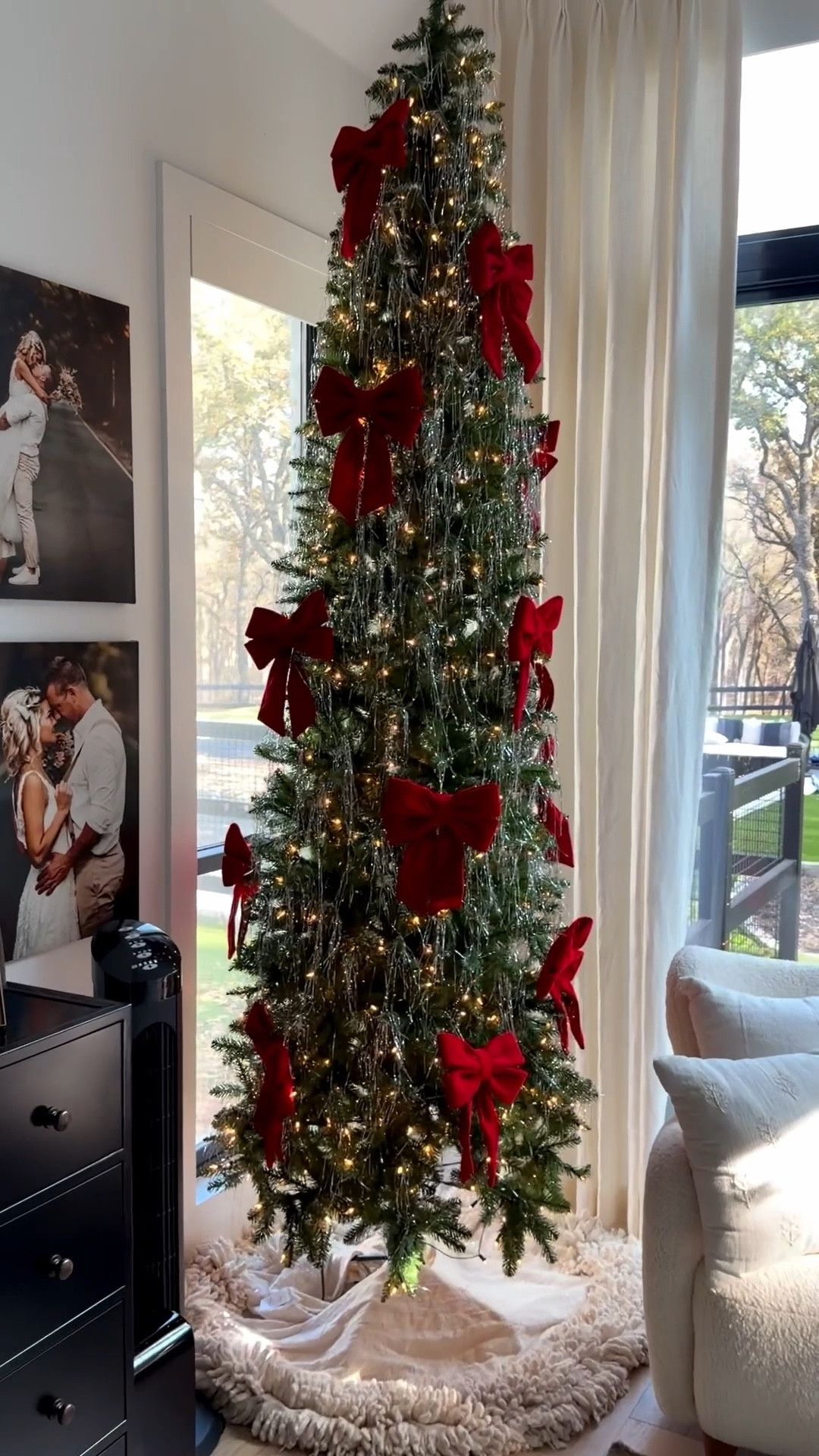 primary bedroom traditional red decor. love these red bows + tinsel for our tree! 

#LTKHome #LTKmomlife #LTKHoliday