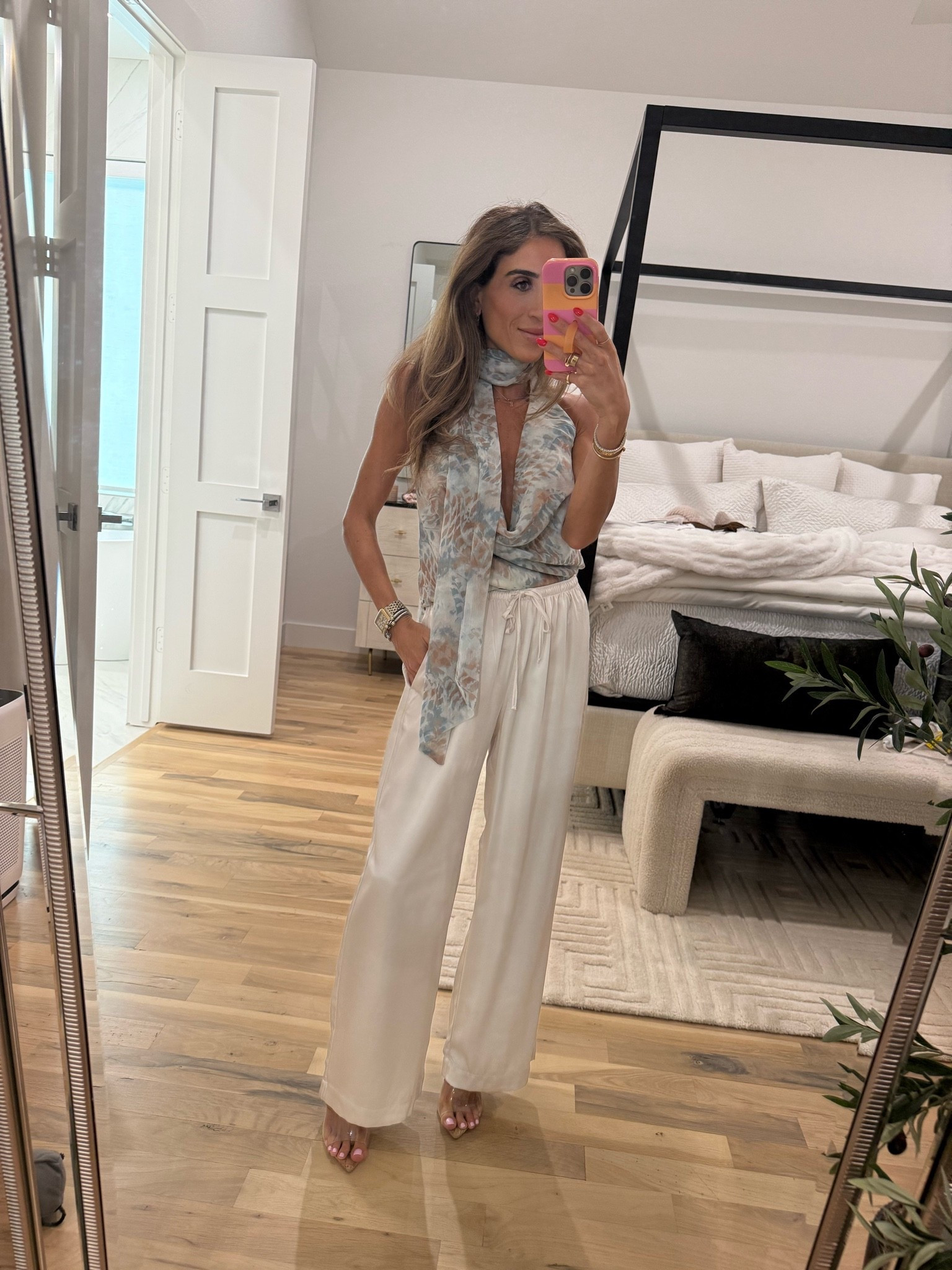 Date night outfit wearing my favorite satin pants with this fun scarf top. Size xxs in pants

#LTKPetite #LTKOver40 #LTKSeasonal