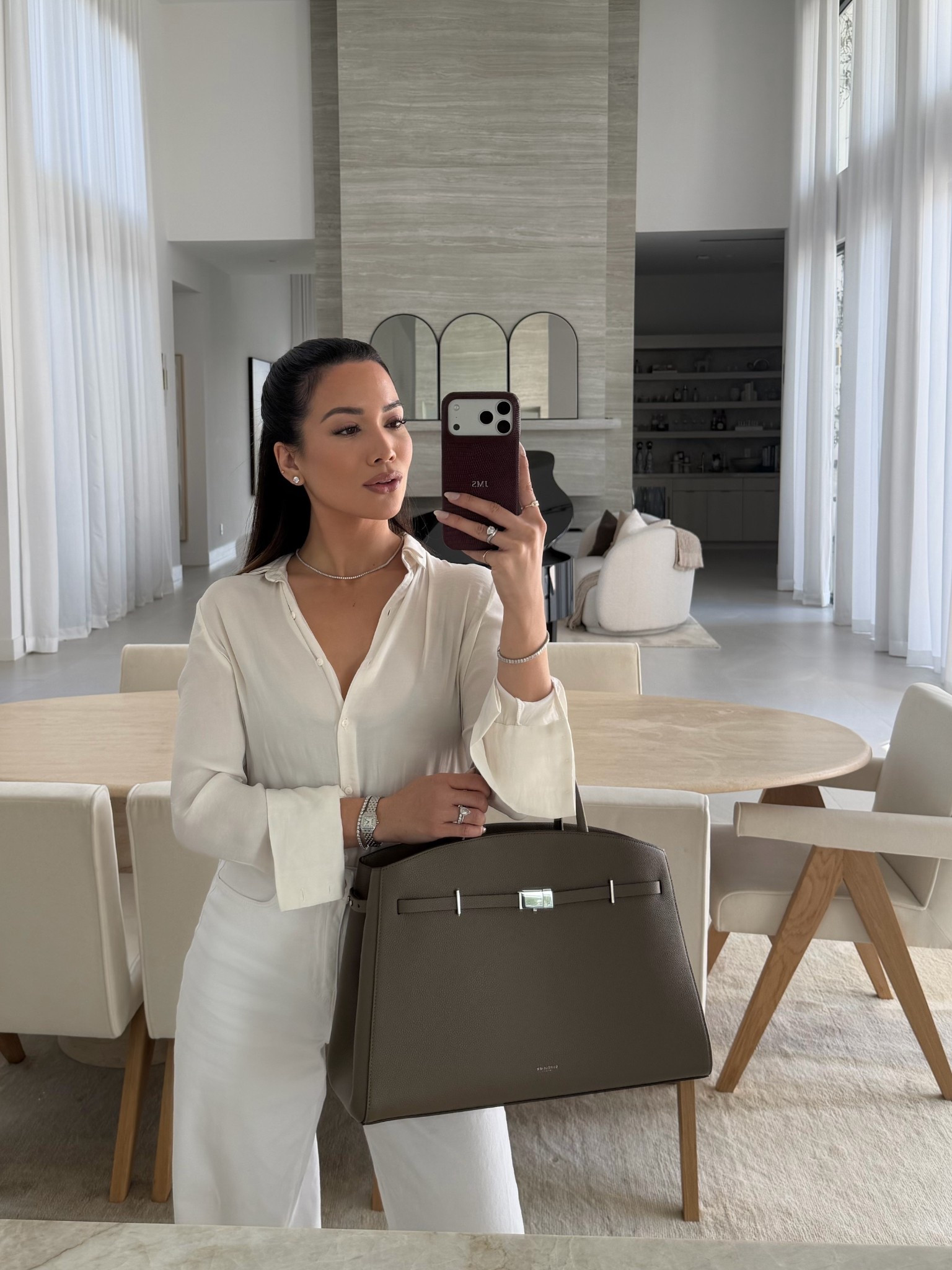 The most chic office bag of my dreams! 🤌🏽 Fits my laptop and all essentials 🩶 The most stunning dark taupe tone with silver hardware… I’m in love! 

#LTKdayinmylife #LTKootd #LTKWorkwear