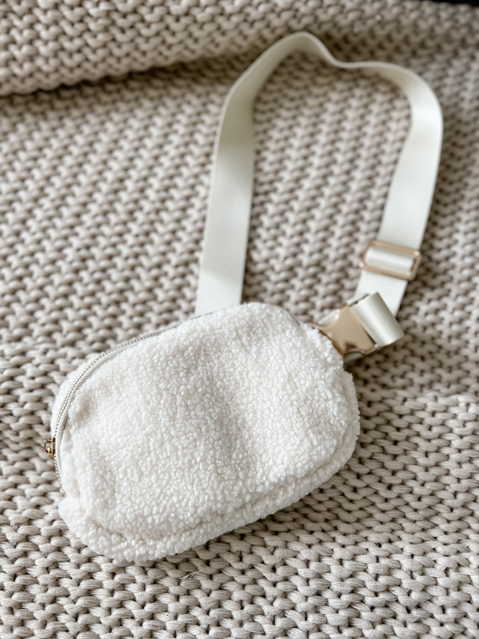 This Lulu lemon look a like belt bag is EVERYTHING. It is high quality and pretty and half the price! I chose the white Sherpa belt bag for winter and I’m obsessed. 

#LTKFind #LTKitbag #LTKunder50