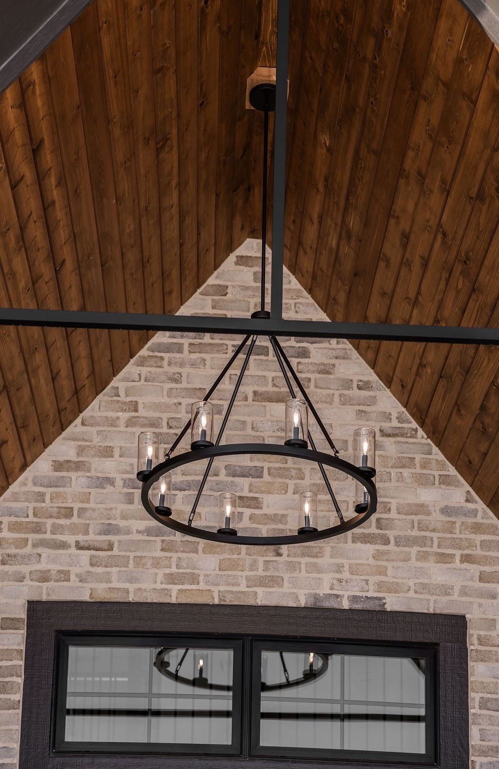 A beautiful large scale outdoor chandelier. Perfect for a vaulted entry! 

#LTKHome #LTKSaleAlert