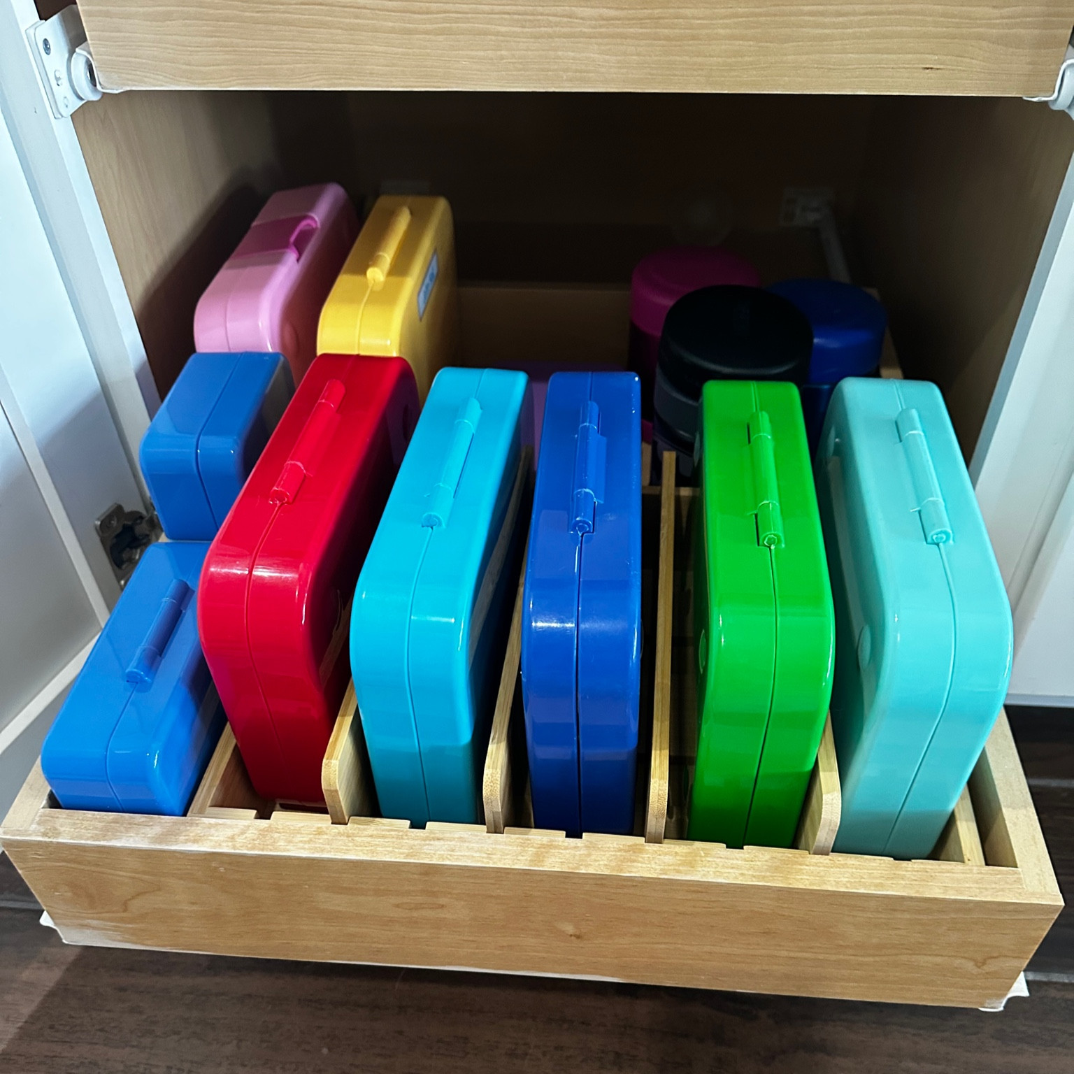 Use a lid organizer to hold the kids lunchboxes  

#LTKkids #LTKfamily #LTKhome