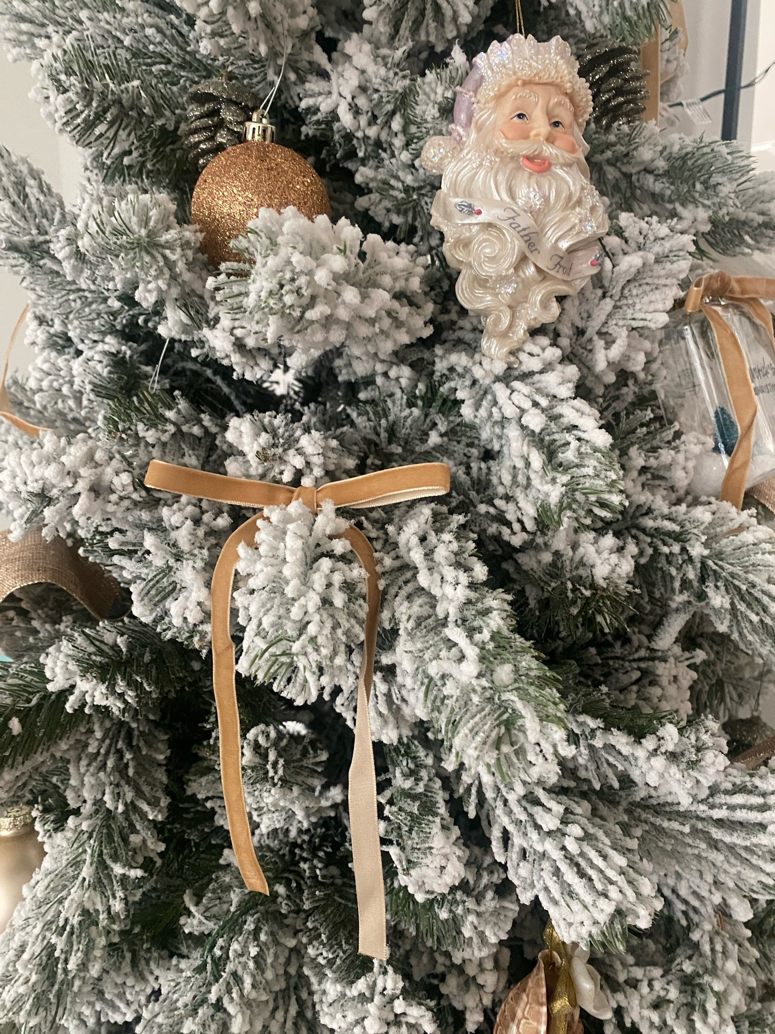 Flocked tree. Christmas bows  

#LTKHoliday #LTKSeasonal