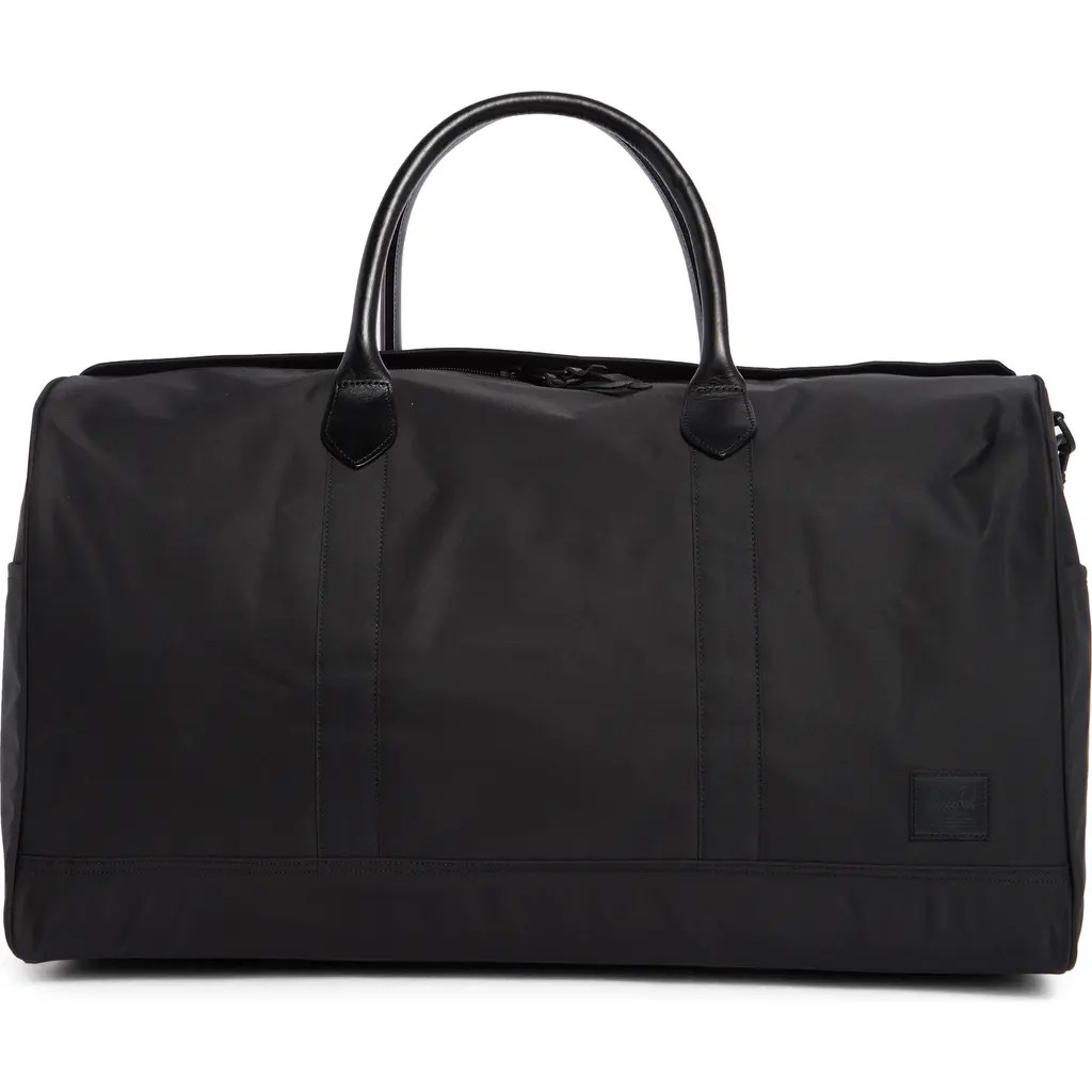 Herschel Supply Co. Novel Premium Duffle Bag in Black at Nordstrom | Nordstrom