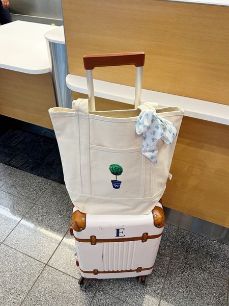 My travel carry on suitcase is from Mark & Graham! Canvas tote and scarf are from my spring emilyOandbows collection! 