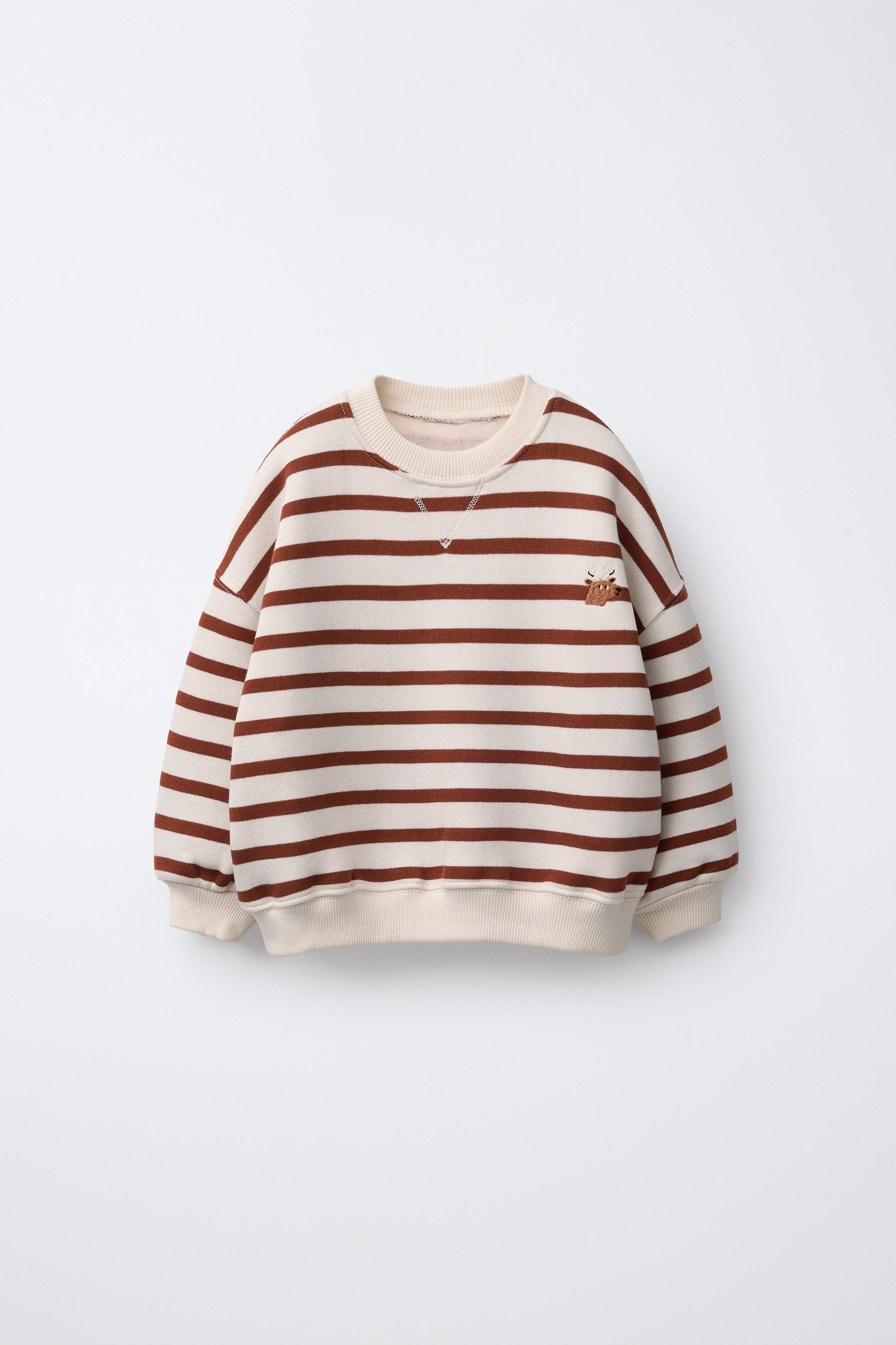Round neck, long sleeve sweatshirt. Ribbed trim. Striped print and embroidered reindeer detail on... | Zara Canada