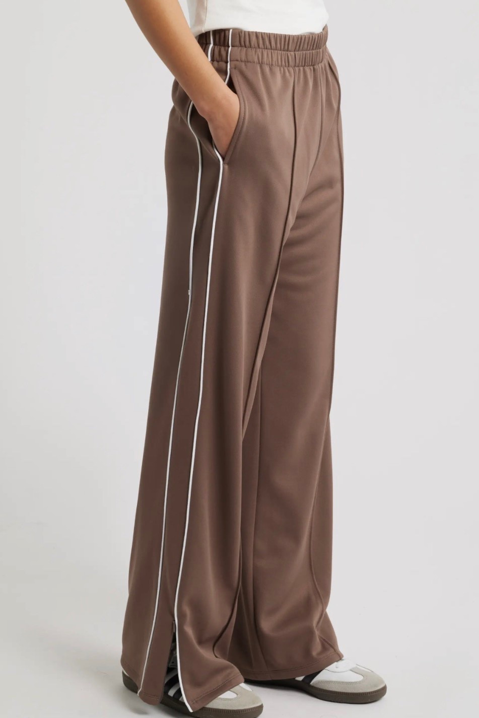 Track pants
Wide leg track pants 

#LTKActive #LTKfitnessgoals