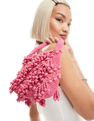 ASOS DESIGN beaded grab bag in hot pink | ASOS (Global)