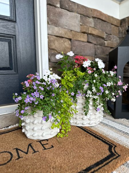 Spring is in full bloom (yayy!) and it’s time to freshen up our outdoor planters! These white ceramic planters are so fun with the pompom texture. I love that they come as a set of 2 for a layered look. I like to add in other pots too for a collected feel. 

They were the perfect addition to my front porch & I want to add some to my back porch too. My back patio is due for a refresh!!

#LTKstyletip #LTKhome #LTKSeasonal