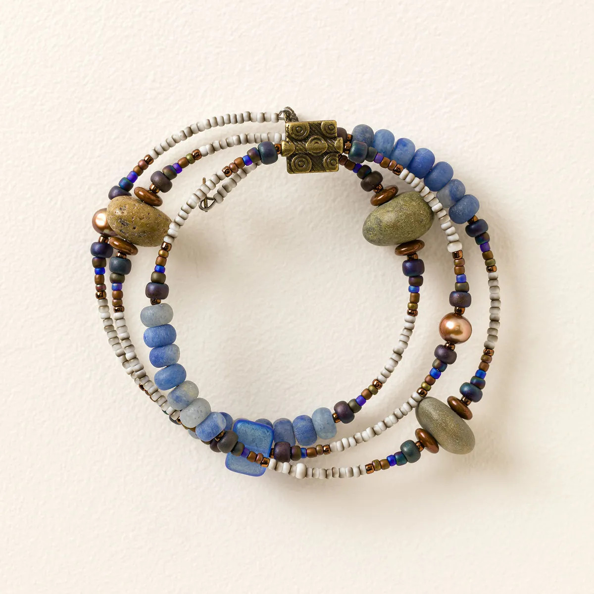 Tumbled Blue Ocean Spiral Bracelet | UncommonGoods