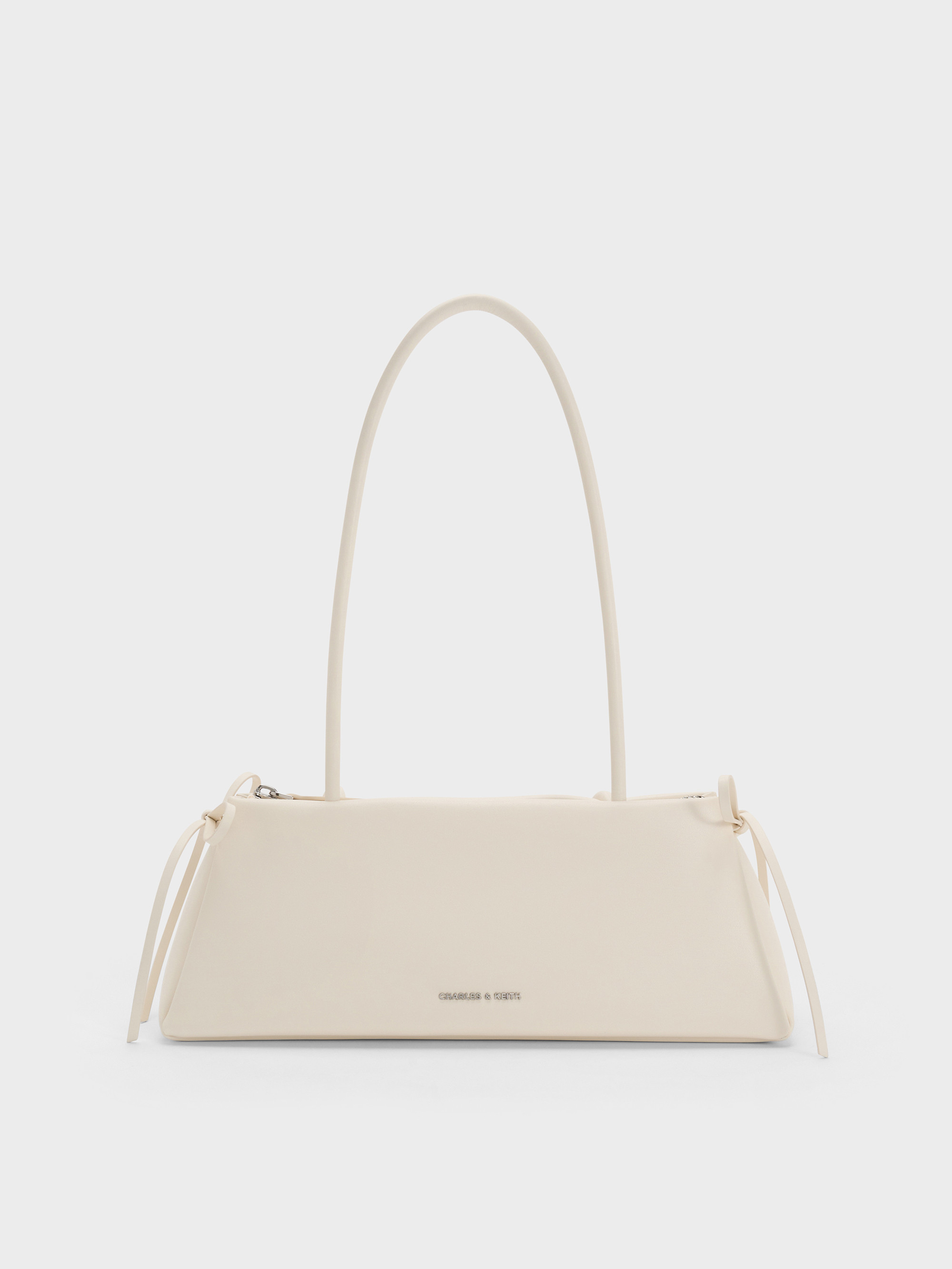 Cream Hazel Bow Elongated Shoulder Bag | CHARLES & KEITH UK | Charles & Keith UK