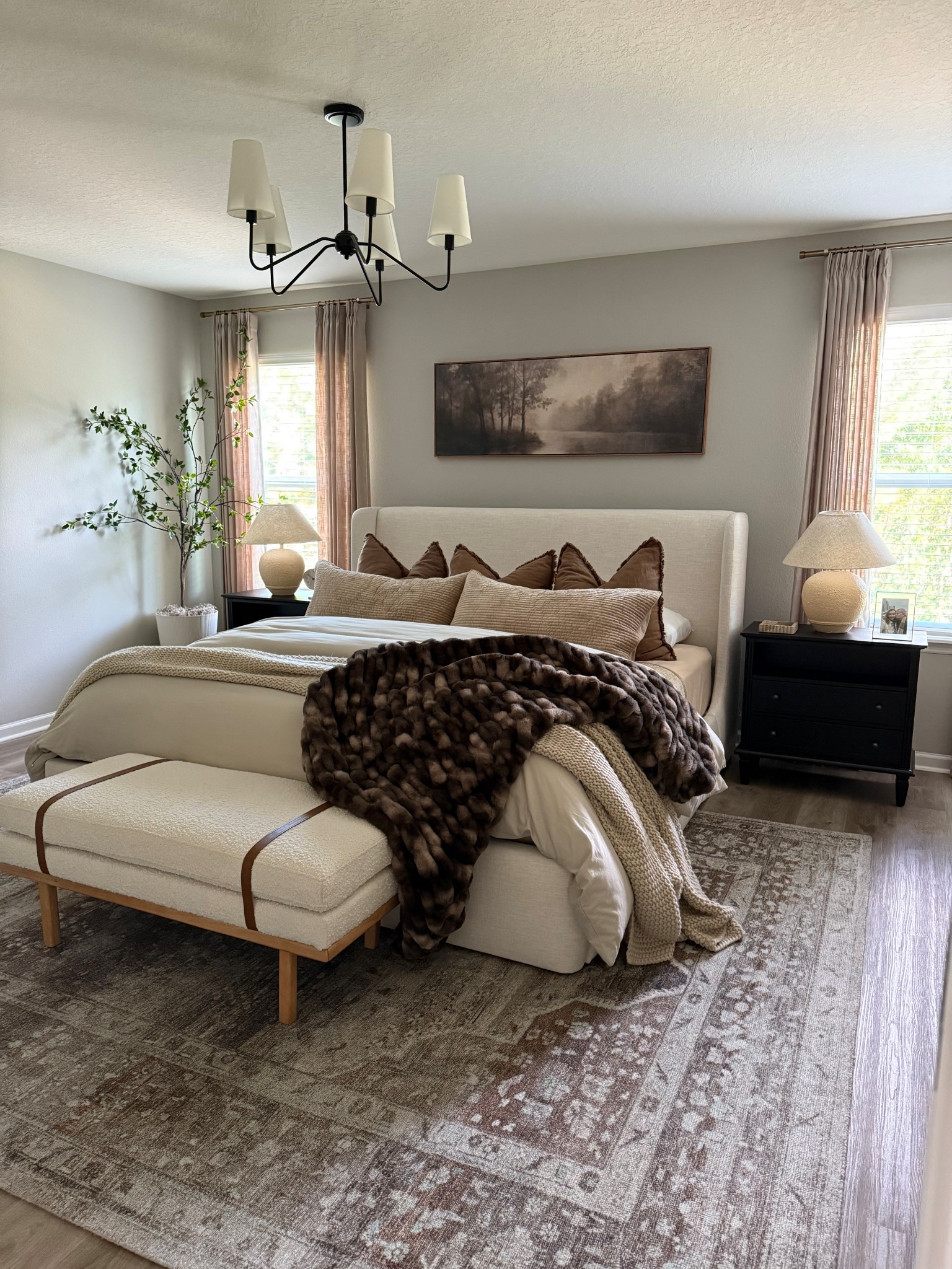 Current bedroom views- I added some new bedding, darker curtains, moody artwork and new rug to complete the fall look 🍂🤎

Master bedroom, Amazon bedding, moody bedroom, moody artwork, landscape art, Amazon home finds, moody bedroom inspiration, fall bedroom, fall decor, fall bedding, black nightstands, Loloi rug, bedroom rug, affordable home finds, end of bed bench, boucle bench, designer inspired home finds, guest bedroom, bedroom inspo 

#LTKHome #LTKSeasonal #LTKSaleAlert