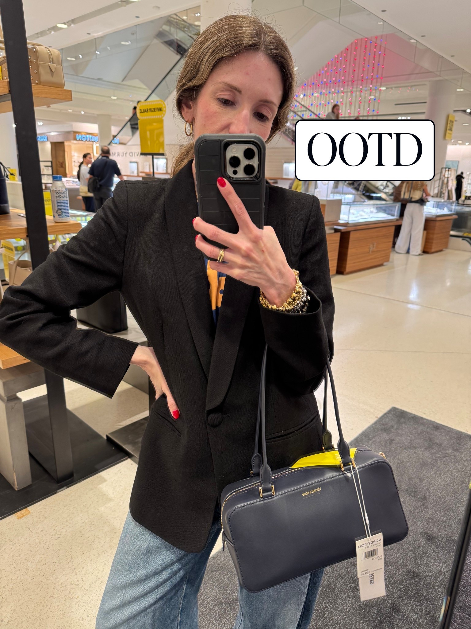 Navy east west bag.

#LTKSaleAlert #LTKItBag #LTKStyleTip
