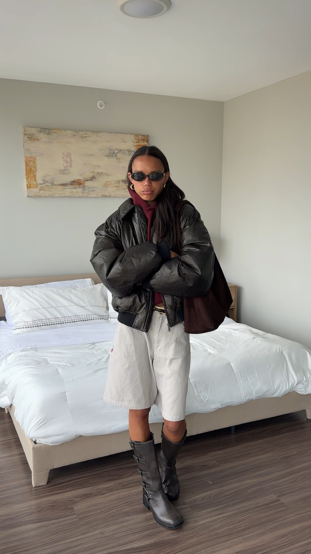 Exact Products:
Shorts - EME Studios 
Hoodie - Akimbo 
Boots - Target 
Jacket - Zara 
Bag - Banana Republic Factory
Sunglasses - Amazon 