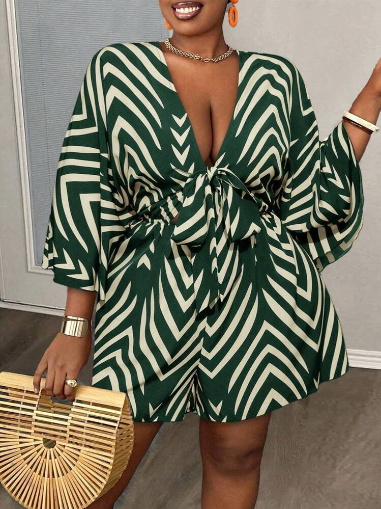 Slaydiva Plus Size Women Holiday Casual V-Neck Loose Printed Jumpsuit With Tie Belt | SHEIN