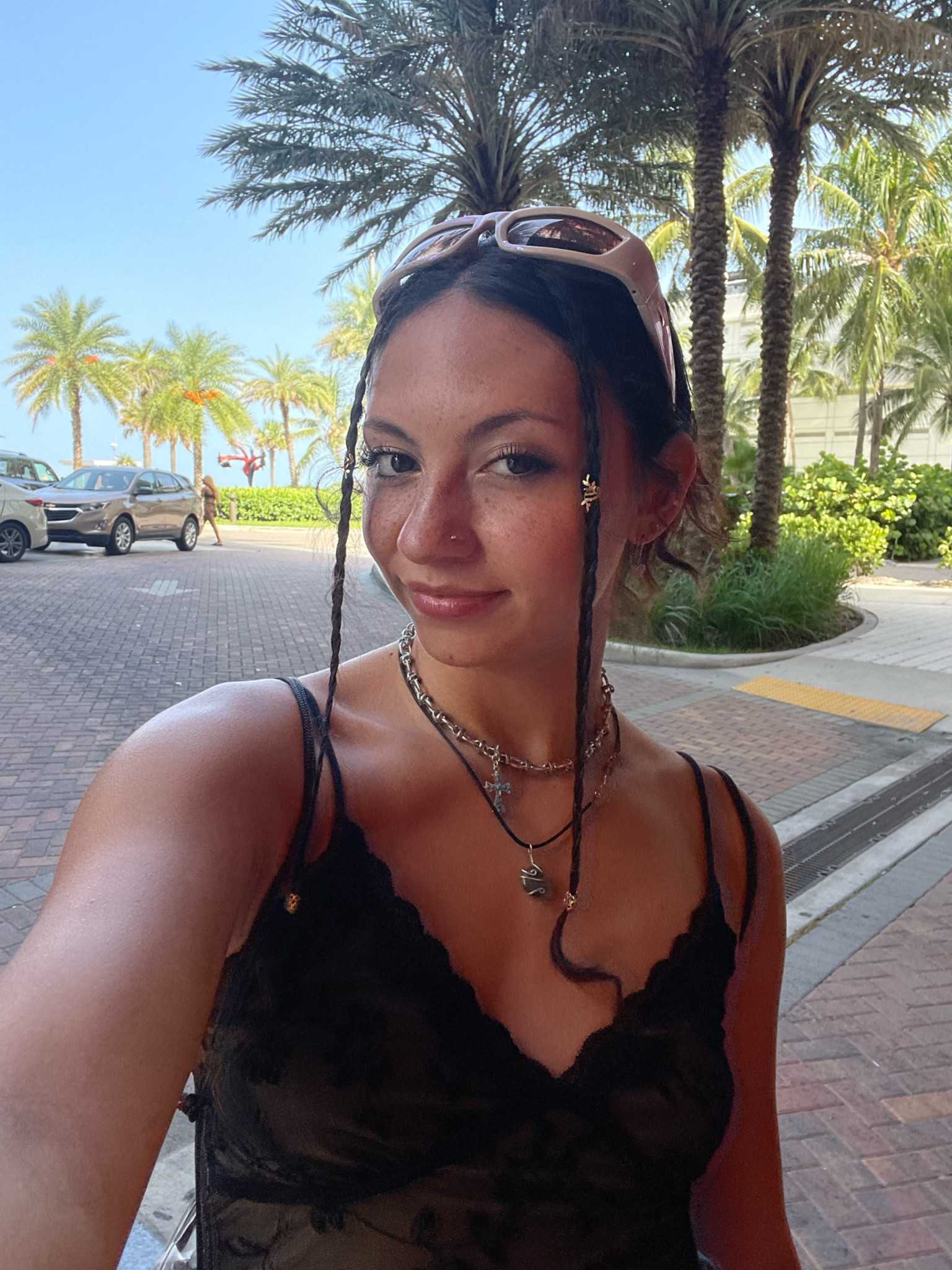Festival Look 🖤⛓️‍💥
One of my favorite looks from Rolling Loud Miami 2023! 
~ Pink iridescent sunglasses from Amazon. 
~ Black lace top. 
~ Chain and charm necklace. 
~ Hair accessories on braids from Amazon. 

#LTKfindsunder50 #LTKSeasonal #LTKstyletip