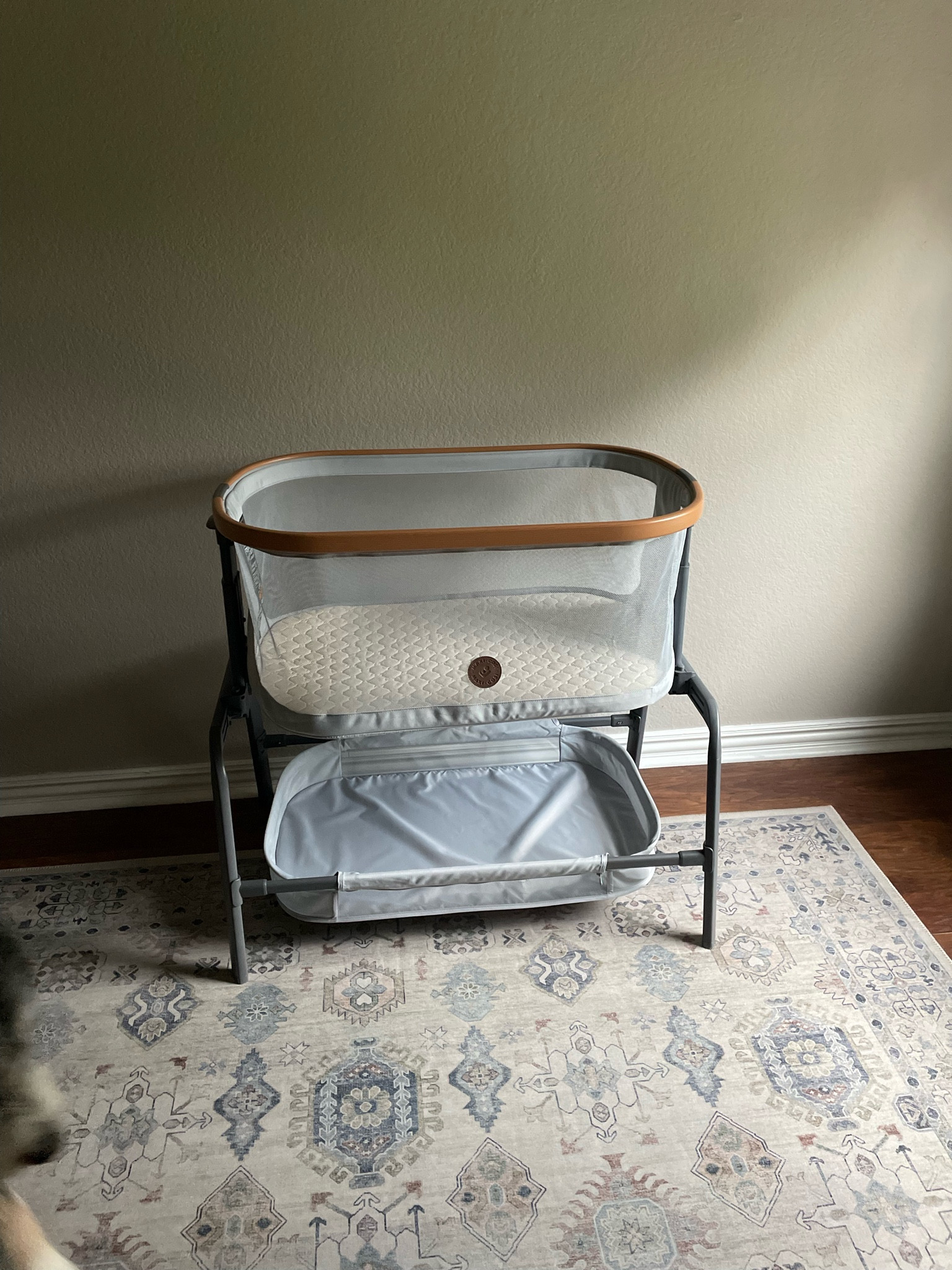 Bassinet for newborn! I loved this as it has height adjustment and the shelving under. I stored extra burp cloths, wipes, diapers, swaddles & more under there! 

#LTKBaby #LTKHome #LTKxNSale