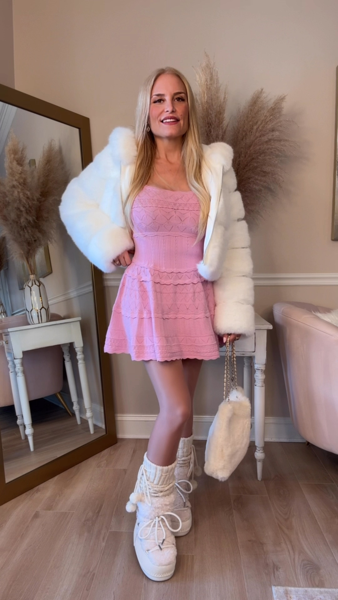 The cutest feminine winter outfit! Loving this pink pointelle flare sweater dress. Will transition perfectly into the spring. Also obsessed with this fluffy, hooded fur coat, so warm and soft! The hood makes it perfect for snow and rain. Also linking some similar white fur moon boots at different price points.

#LTKSeasonal #LTKOver40 #LTKStyleTip