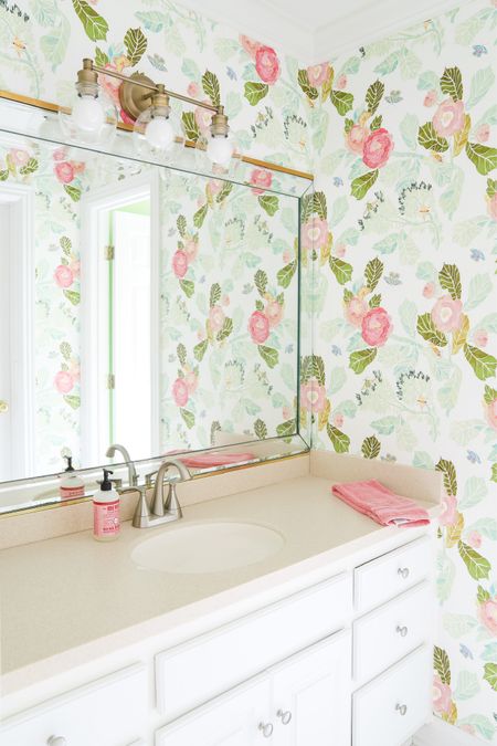 Our daughter’s bathroom features this lovely wallpaper and this cute light fixture !

#LTKHome