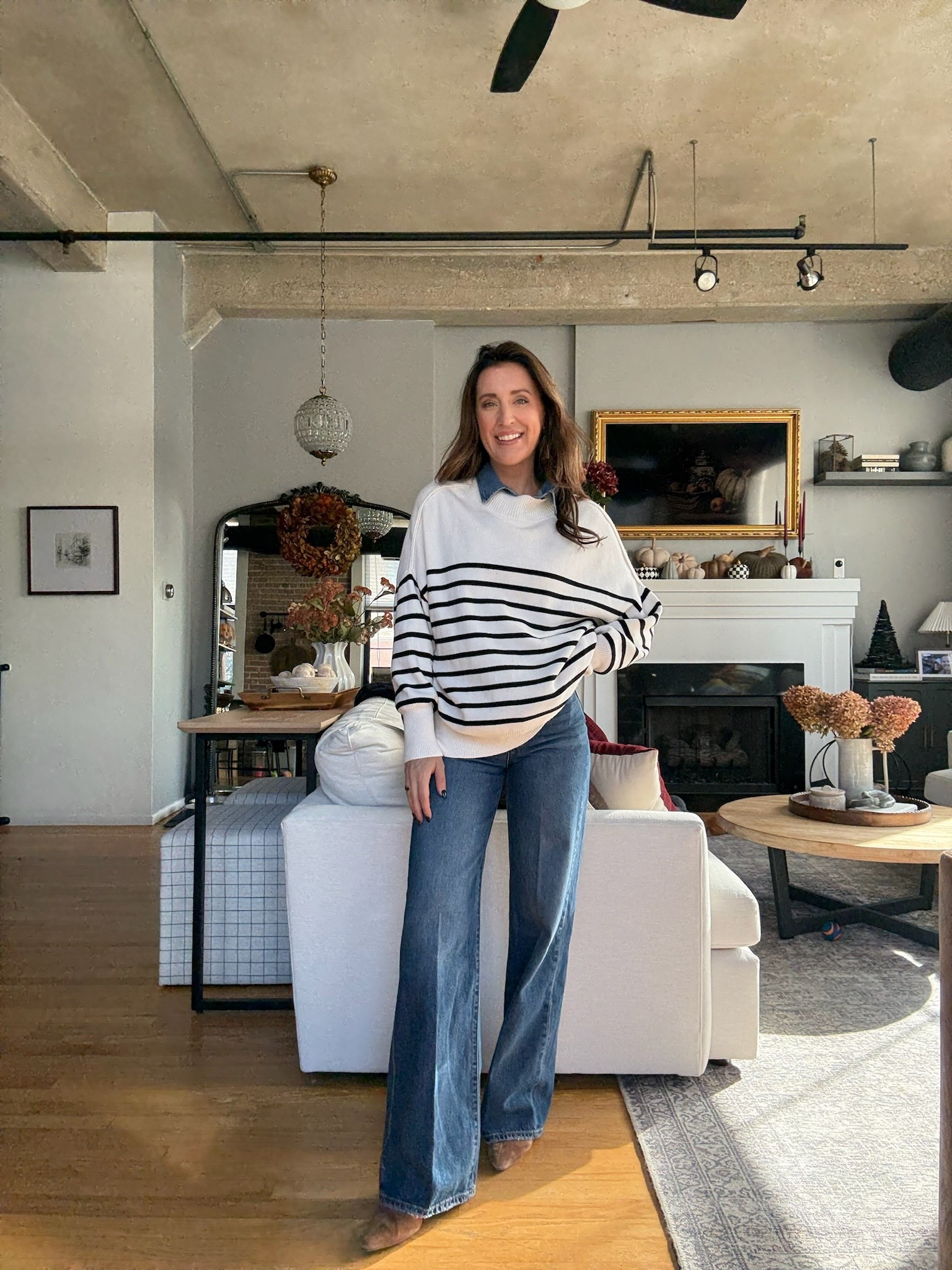 Layered this denim collared shirt with this white and black oversized sweater (sized up to a M). 

#LTKStyleTip #LTKSaleAlert #LTKFindsUnder50