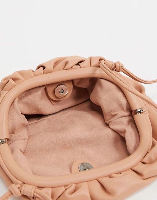 Steve Madden Necture slouchy clutch bag in tan | ASOS (Global)