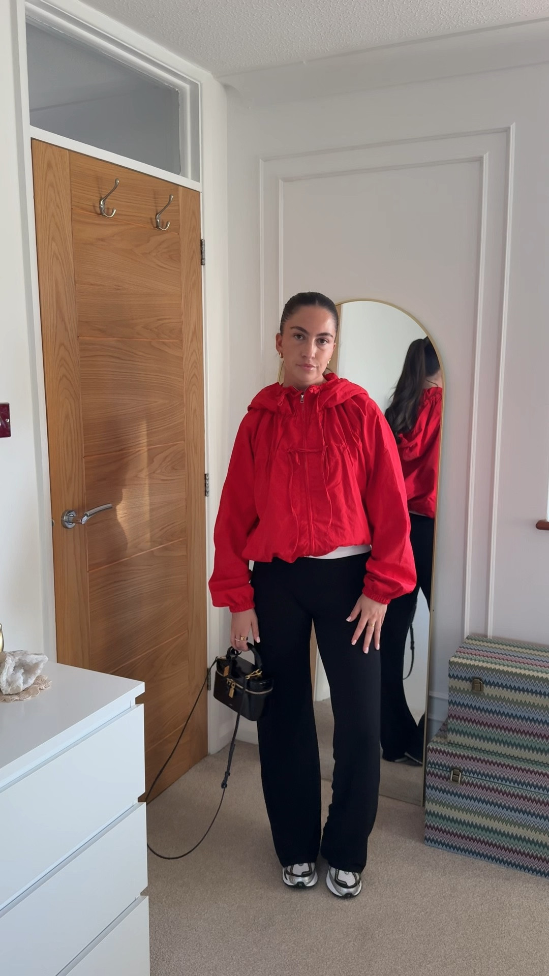 Running errands - red windbreaker - black flares - new balance - fashion - casual outfit - sporty 

#LTKspring #LTKFashionMonth #LTKstyletip