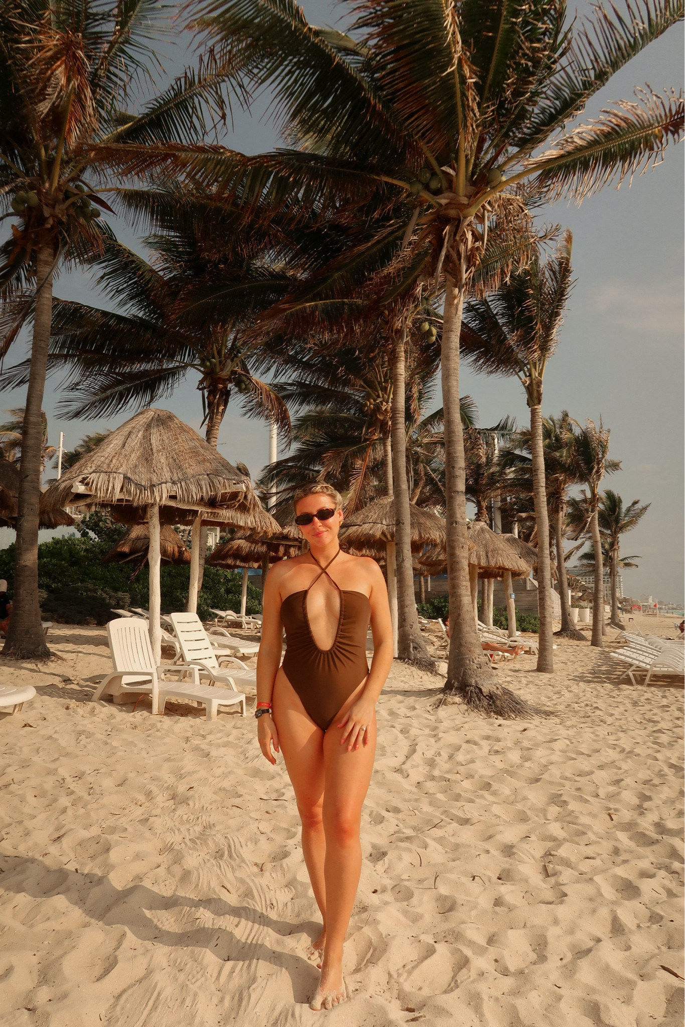 Low cut + low back brown one piecee

#LTKswim #LTKsalealert #LTKfindsunder100