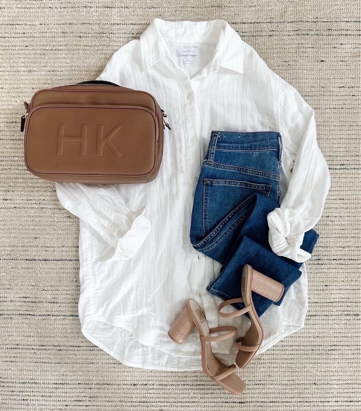 Spring outfit with oversized cotton white button up shirt styled with skinny jeans and sandals for a chic look!

#LTKootd #LTKSeasonal