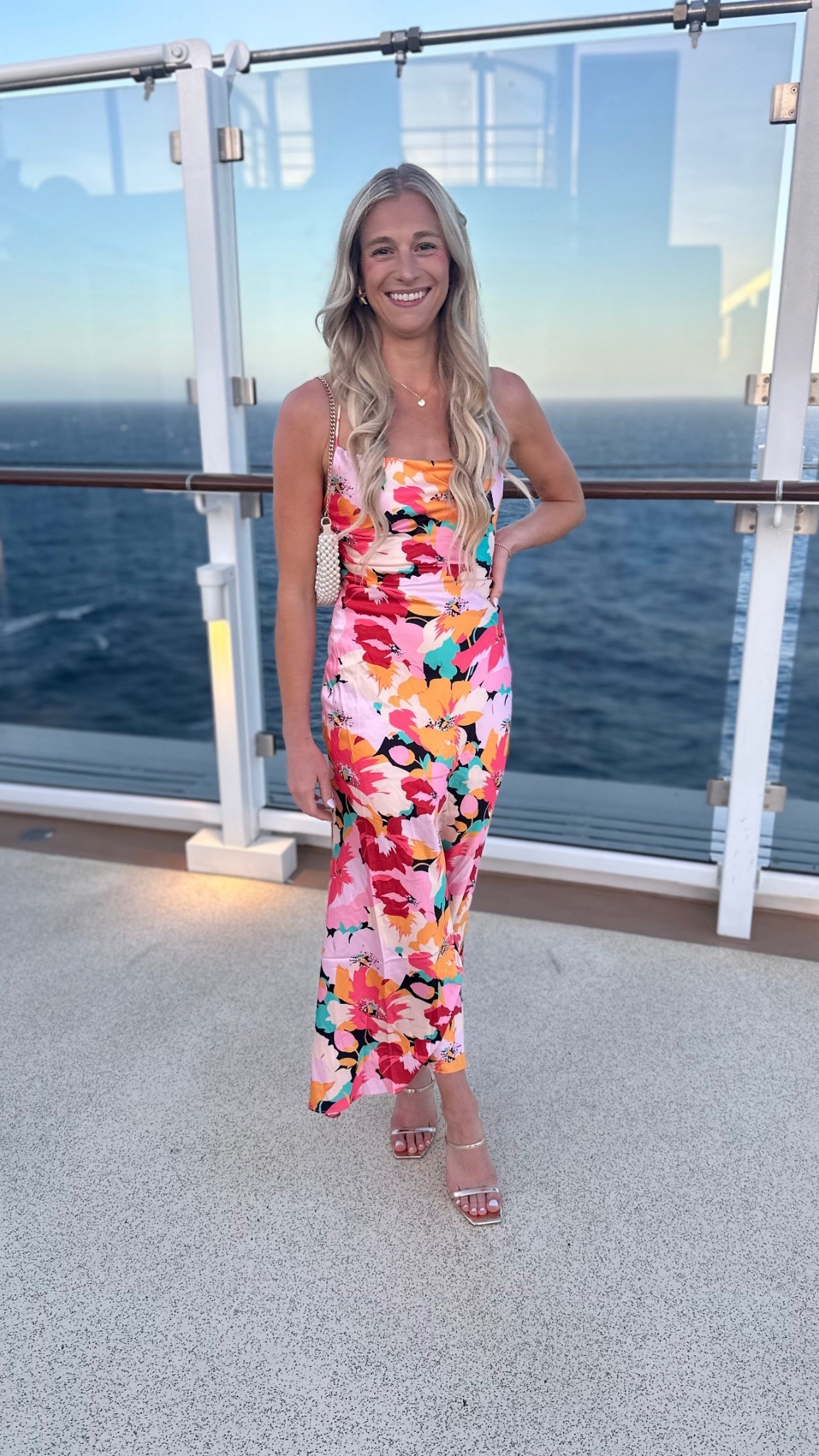 Obsessed with this dress I wore on my cruise vacation! The colors are stunning!!  Would also be perfect as a wedding guest dress! Dress is an xs and fits TTS  

#LTKStyleTip #LTKWedding #LTKFindsUnder100