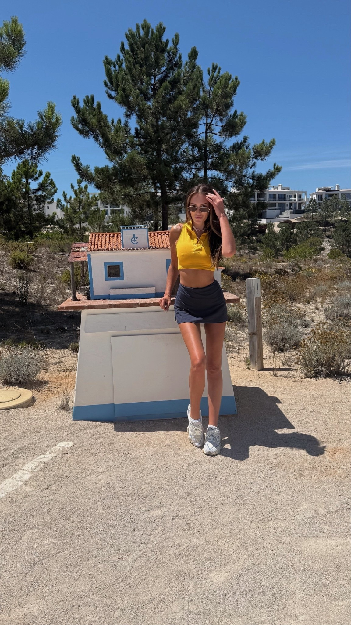 Sporty and sun-ready ☀️ This yellow cropped polo top paired with a navy athletic mini skirt and chunky dad sneakers is such a great casual summer look!

#LTKSeasonal #LTKStyleTip #LTKShoeCrush