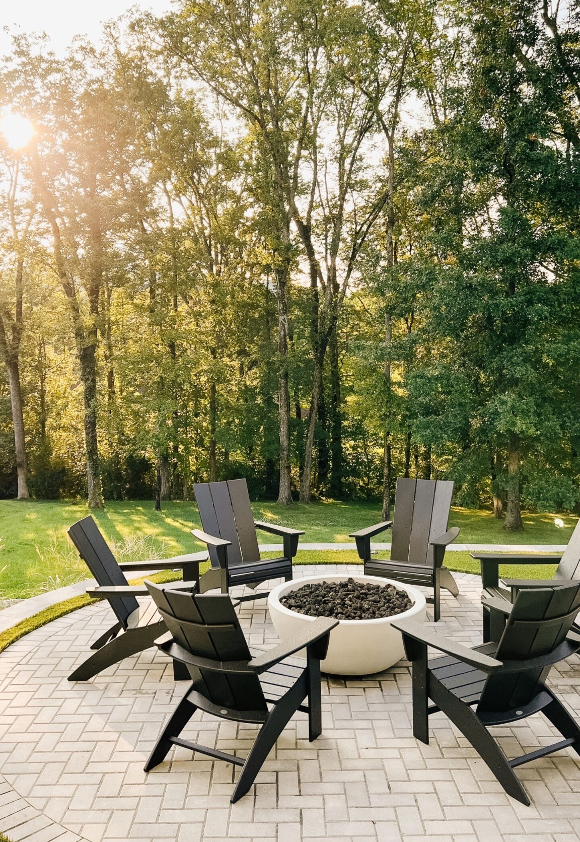 #ad We spend so much time in our backyard thanks to these comfy chairs and fire pit. The Adirondack chairs are currently on sale and look amazing three years later. Also linking our go-to faux topiary plants. #wayfairpartner @wayfair #wishyouwerehere #outdoor #wayfair 