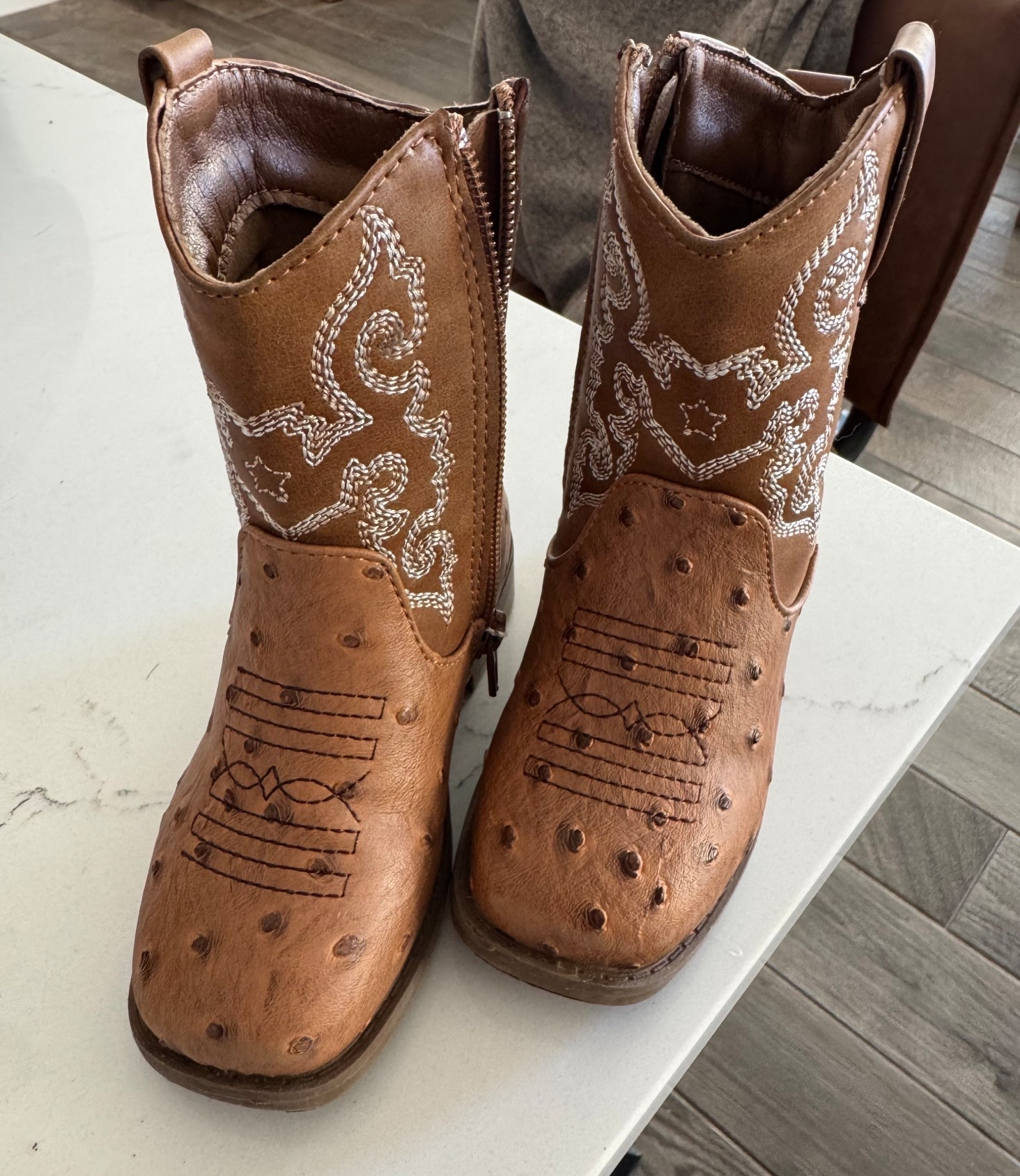 Cutest cowboy boots that look like real ostrich from Walmart! 

#LTKFamily #LTKKids