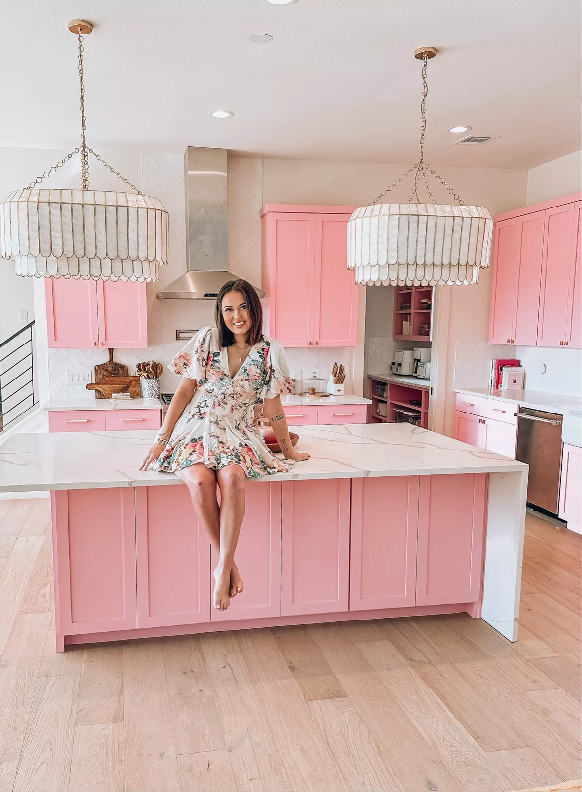 Woman praised for painting her kitchen appliances pink