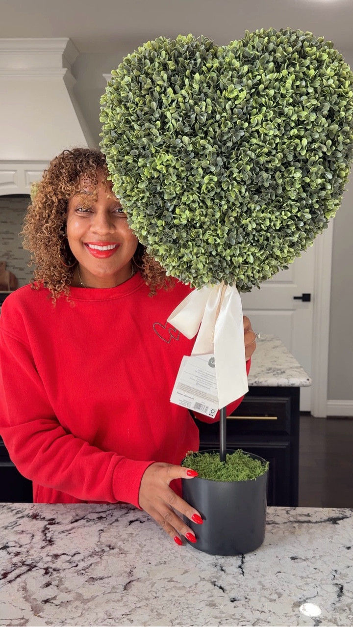 Comment “Heart” and I’ll DM you the link it’s on major sale

Spreading some love one doorway at a time 

This heart topiary was a must have, but I had to jazz it up a bit. Added a cute heart day mat and I’m keeping my Christmas wreath up bc I love the colors for now. 

#valentinesdecor #valentinesdaydecor #walmartfind #frontporchdecor #homedecorationsinspiration